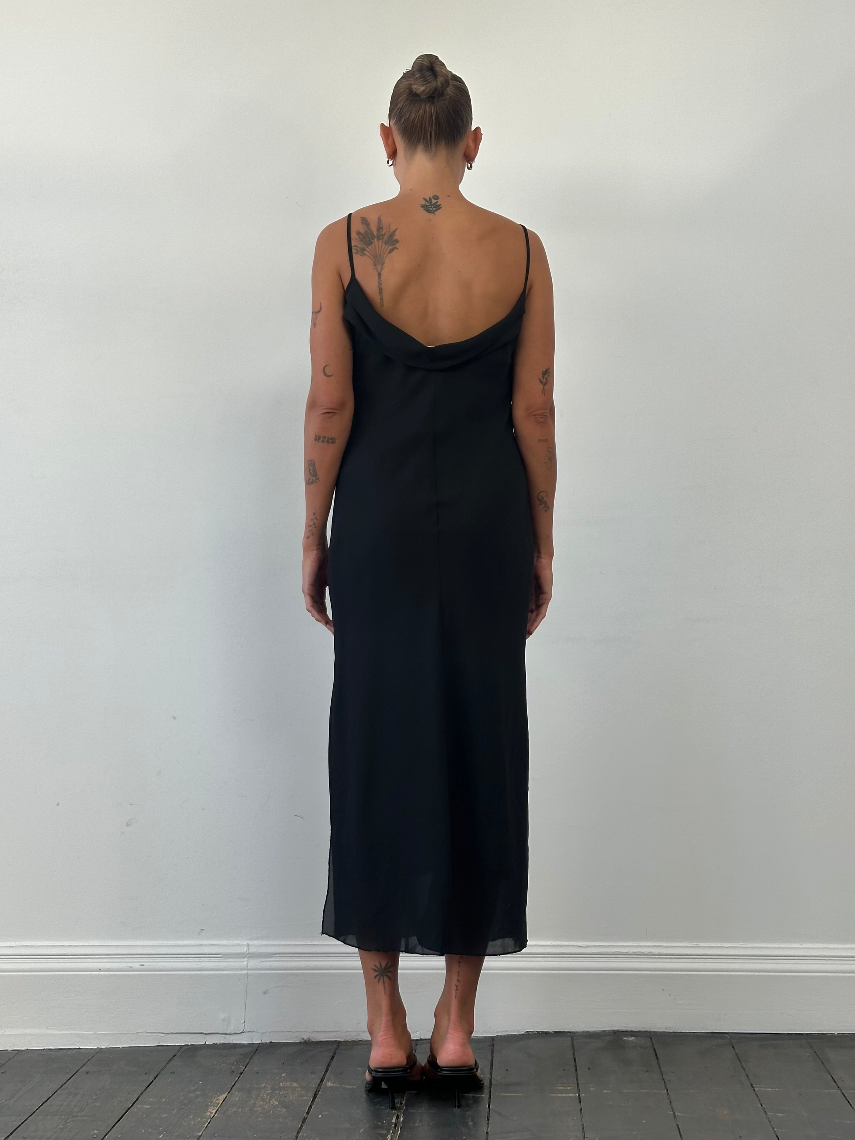 Vintage Italian maxi dress with a cowl neck, featuring a flowing silhouette in a classic design, size M.