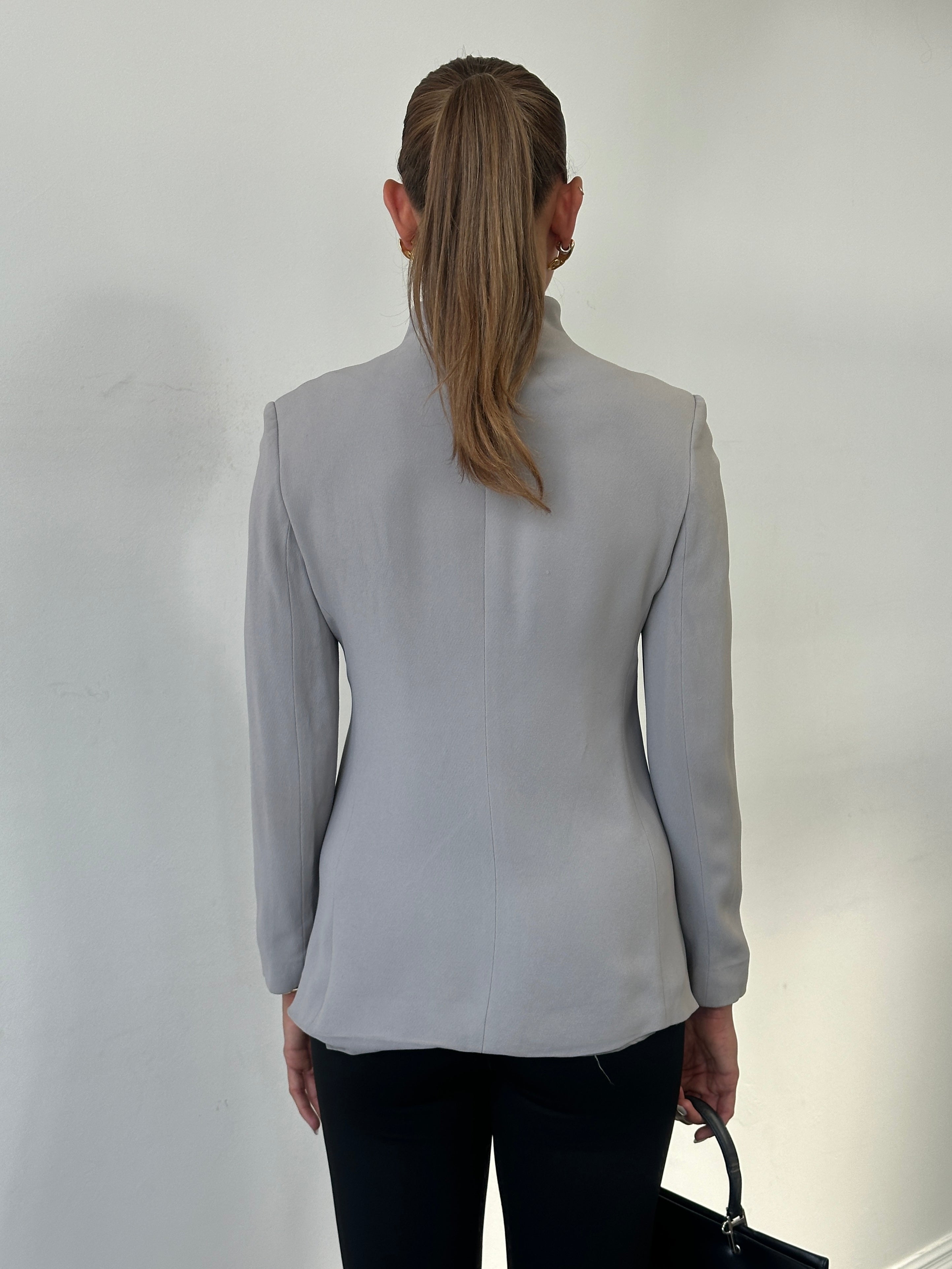 Emporio Armani high neck fitted blazer jacket in sleek design, shown in black, tailored for a minimal, stylish look.
