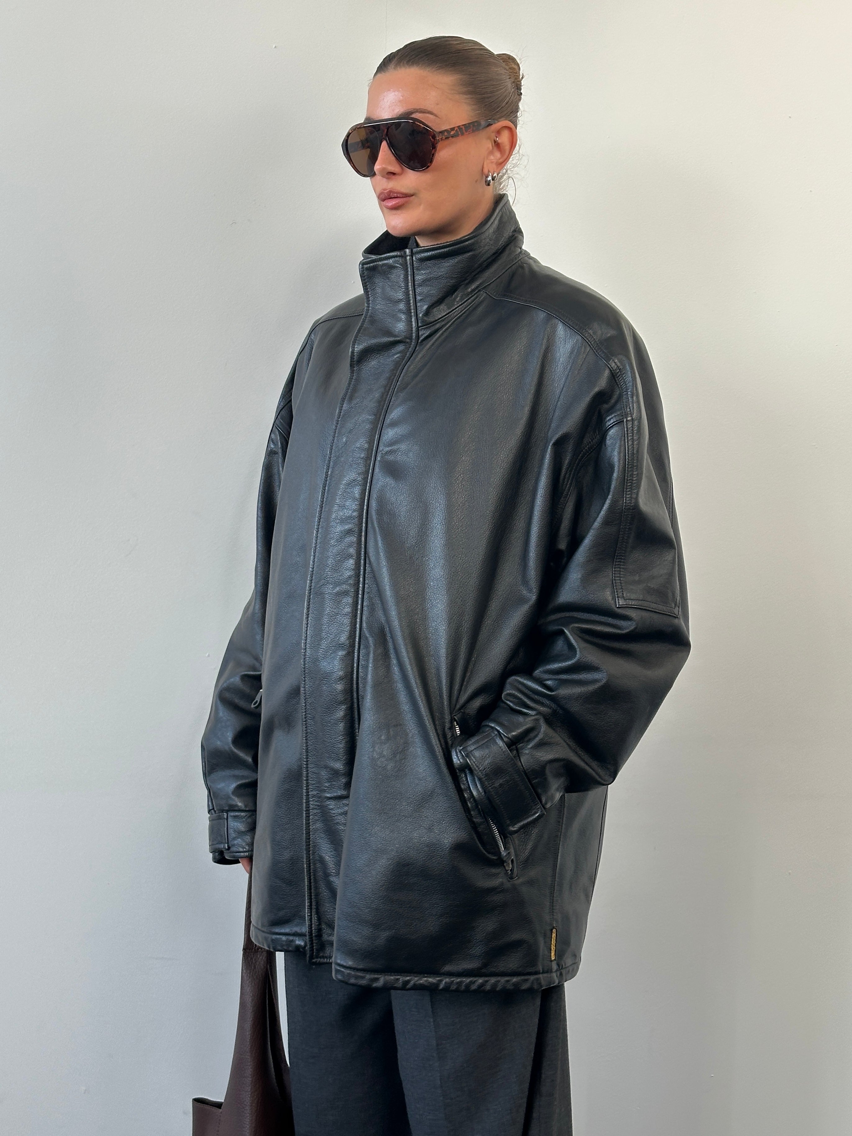 Armani Jeans black leather jacket with high neck and double zip closure, size XXL, stylish and fitted for a modern look.