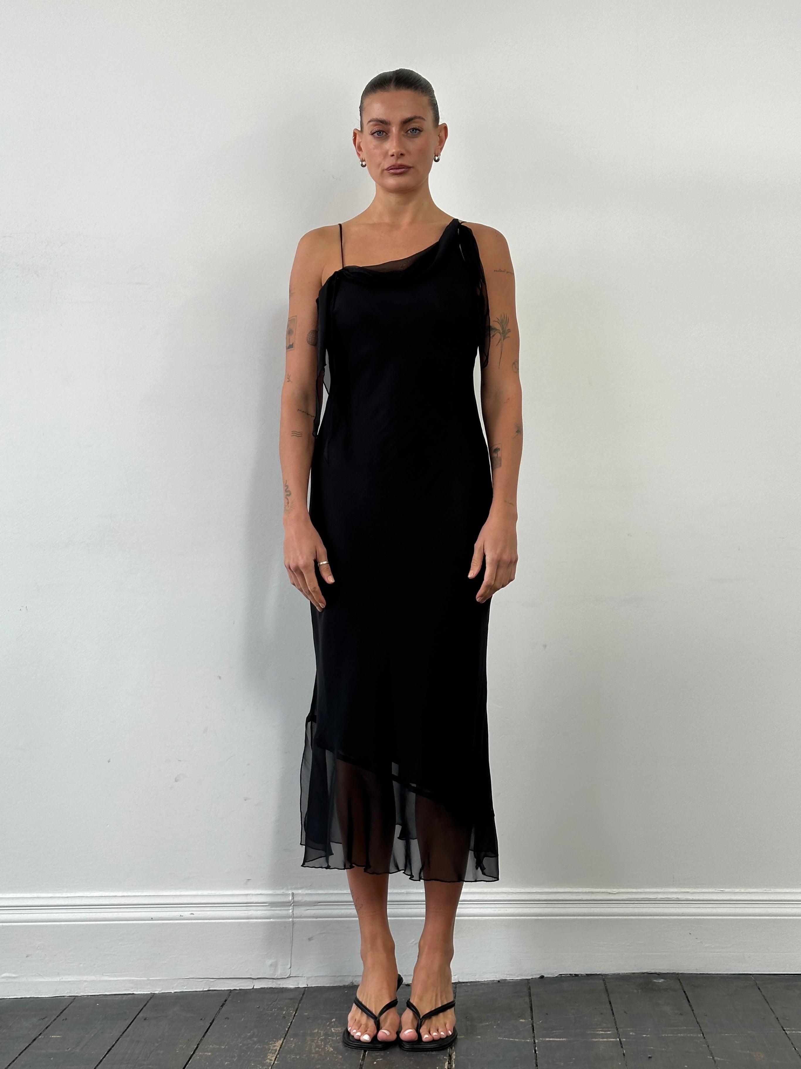 Vintage asymmetric sheer maxi slip dress in size M, flowing design with a lightweight, transparent fabric for elegant evening wear.