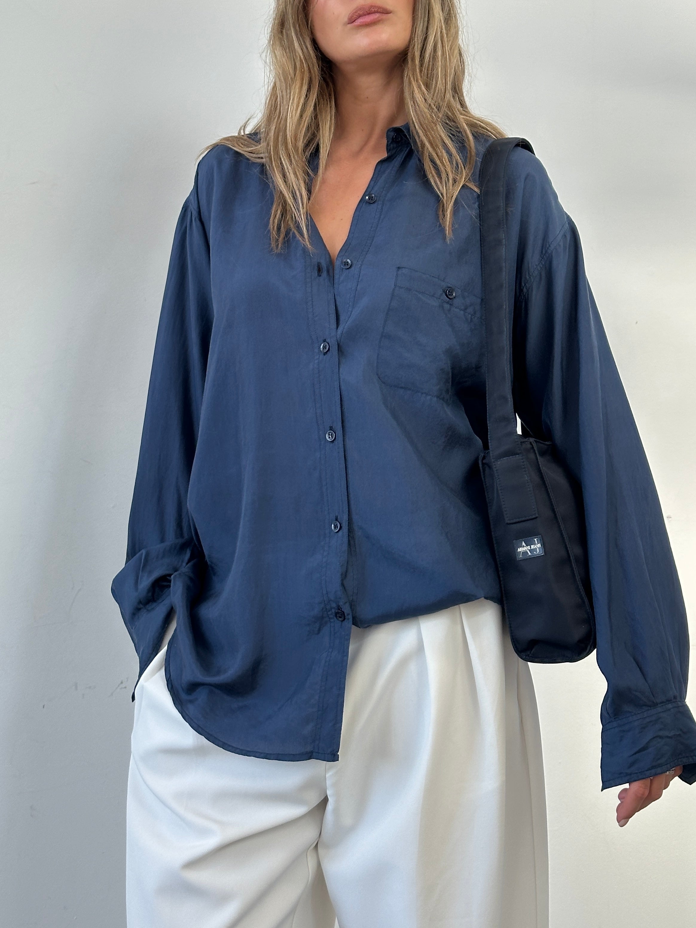 Vintage relaxed pure silk shirt in XL size, showcasing soft, shiny fabric and classic collar design.