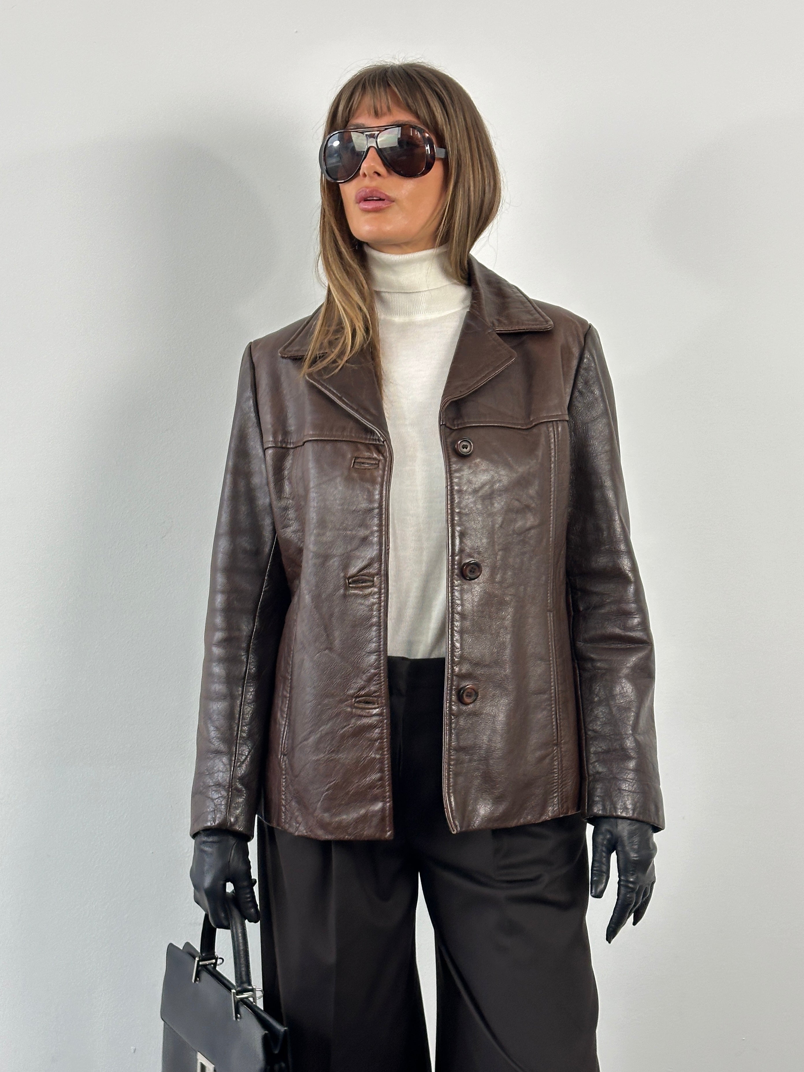 Vintage 1990s high button leather jacket in size M, featuring classic style and durable leather material.
