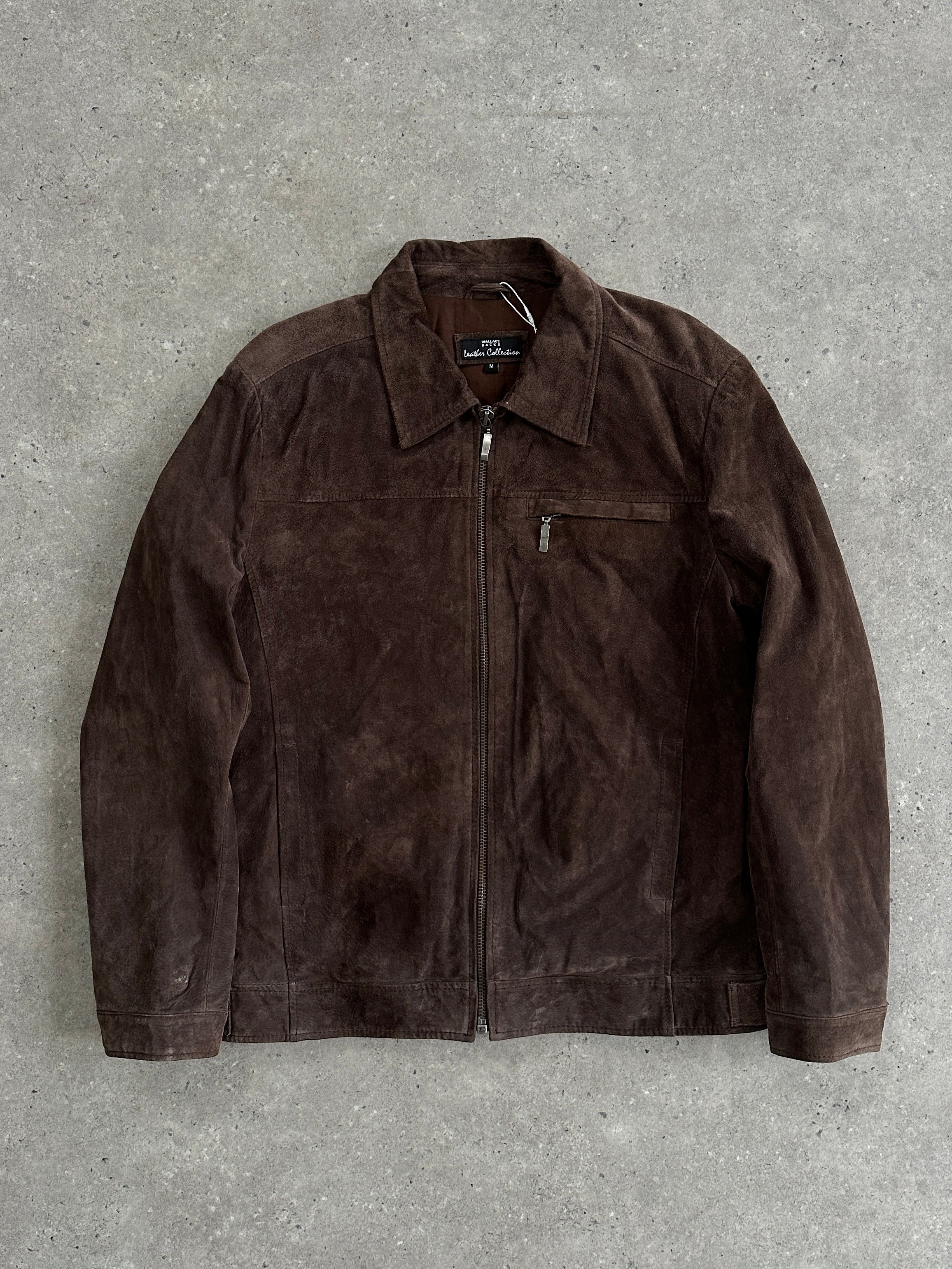 Vintage suede zip-up jacket in size L, featuring a classic design with a front zipper and soft suede material.