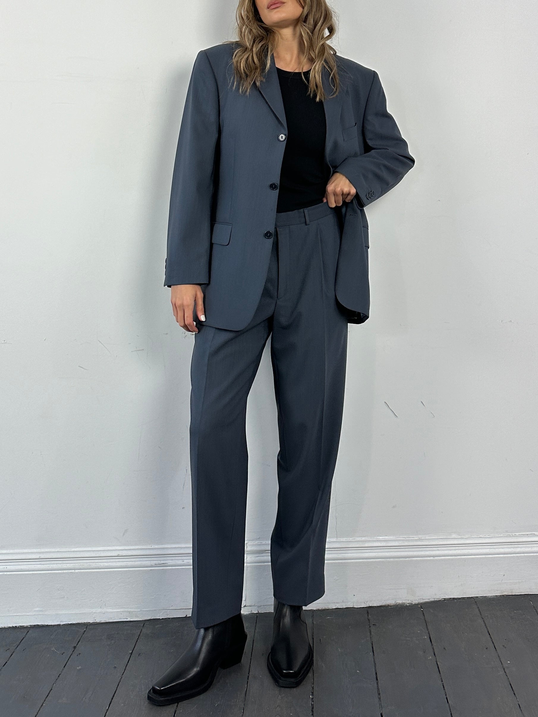 Balmain pure wool single-breasted suit jumpsuit in size 38S/W32, tailored fit with lapel collar and button closure.