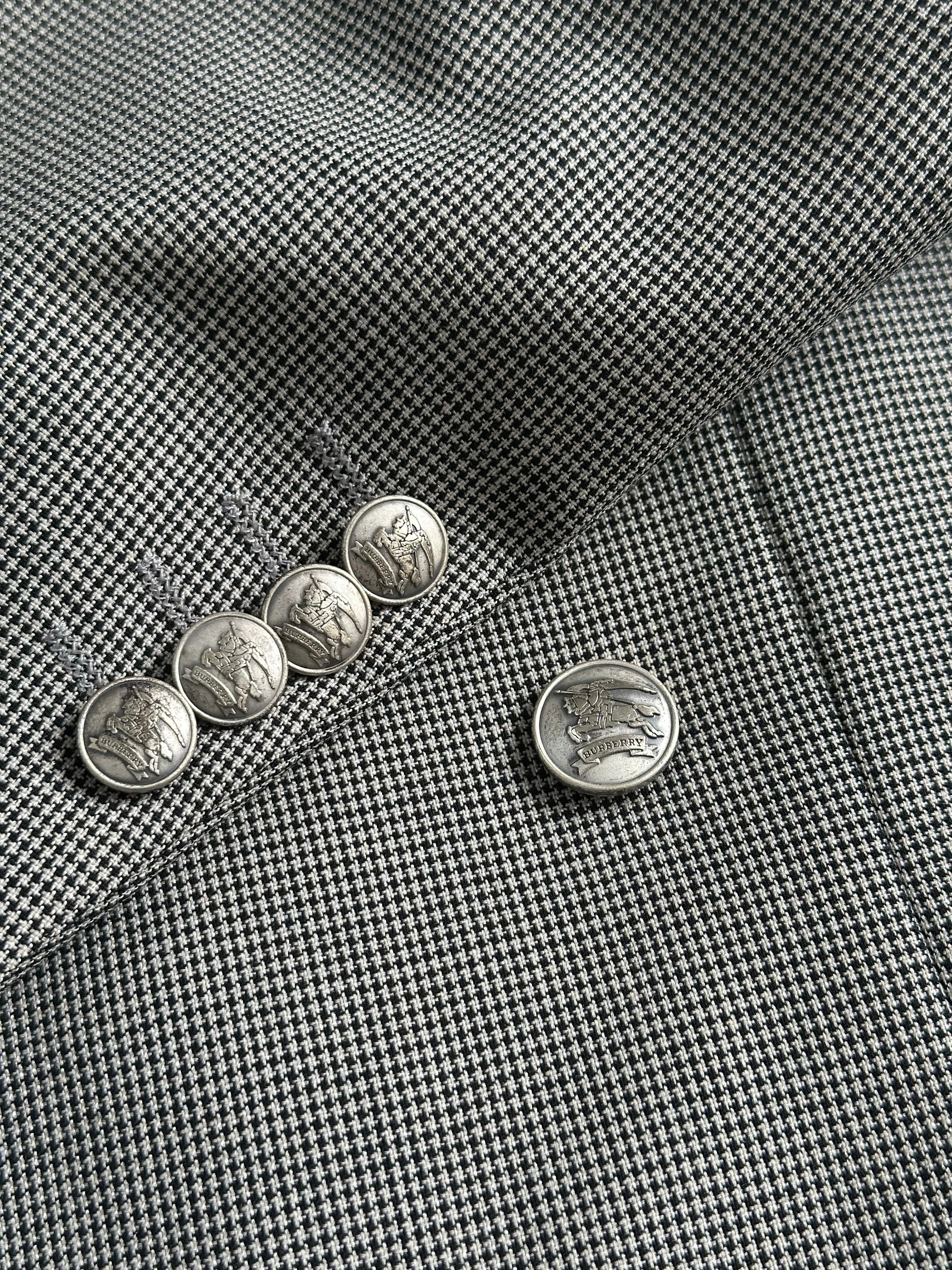 Burberry 1990s bespoke button wool double-breasted blazer in size L, featuring classic tailoring and signature check lining.
