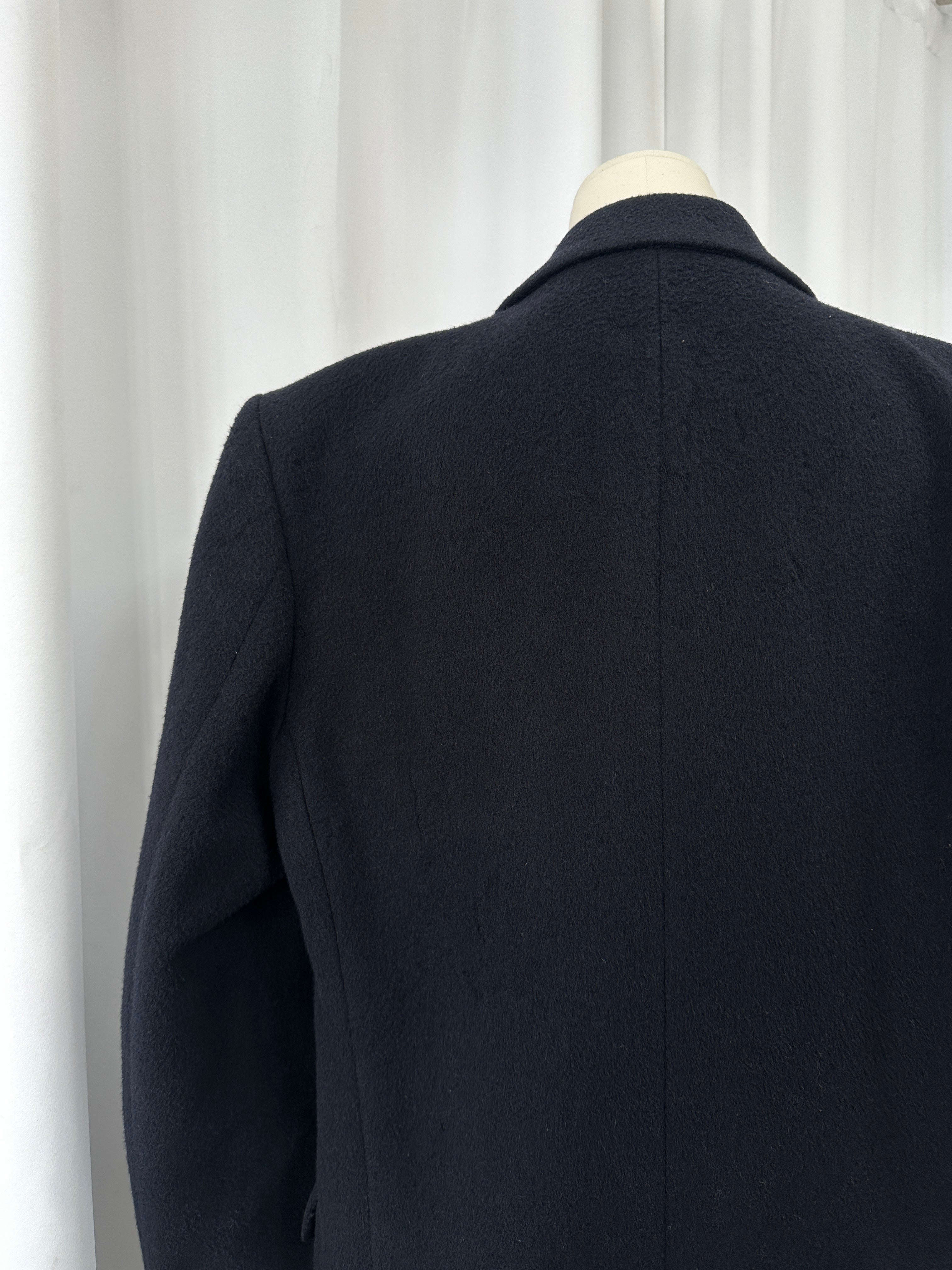 Vintage British 1990s wool and cashmere double-breasted coat in XL, featuring a classic tailored design and rich textured fabric.