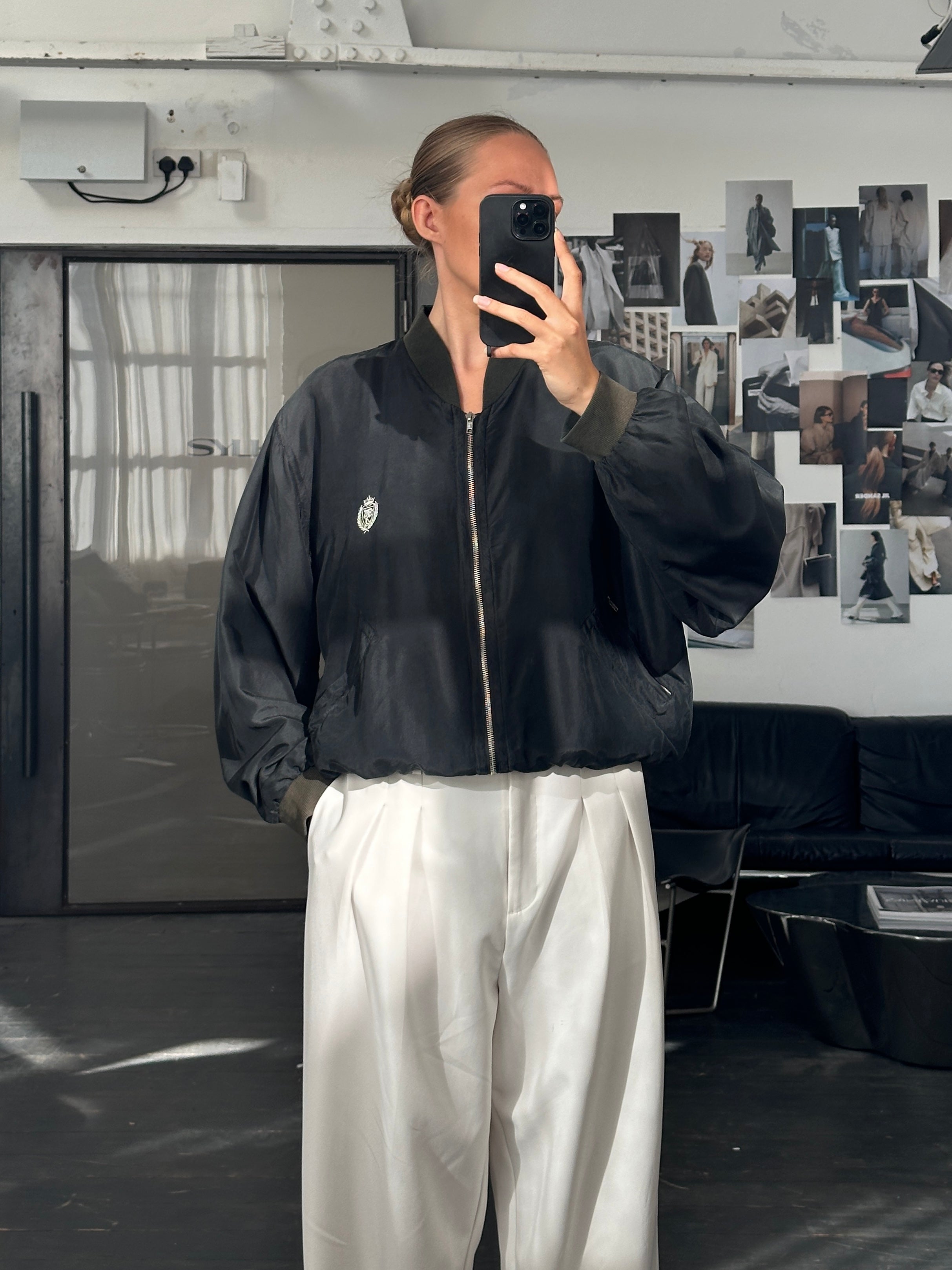Vintage 1990s pure silk bomber jacket in size M/L, featuring a classic 90s design with smooth silk fabric and ribbed cuffs.