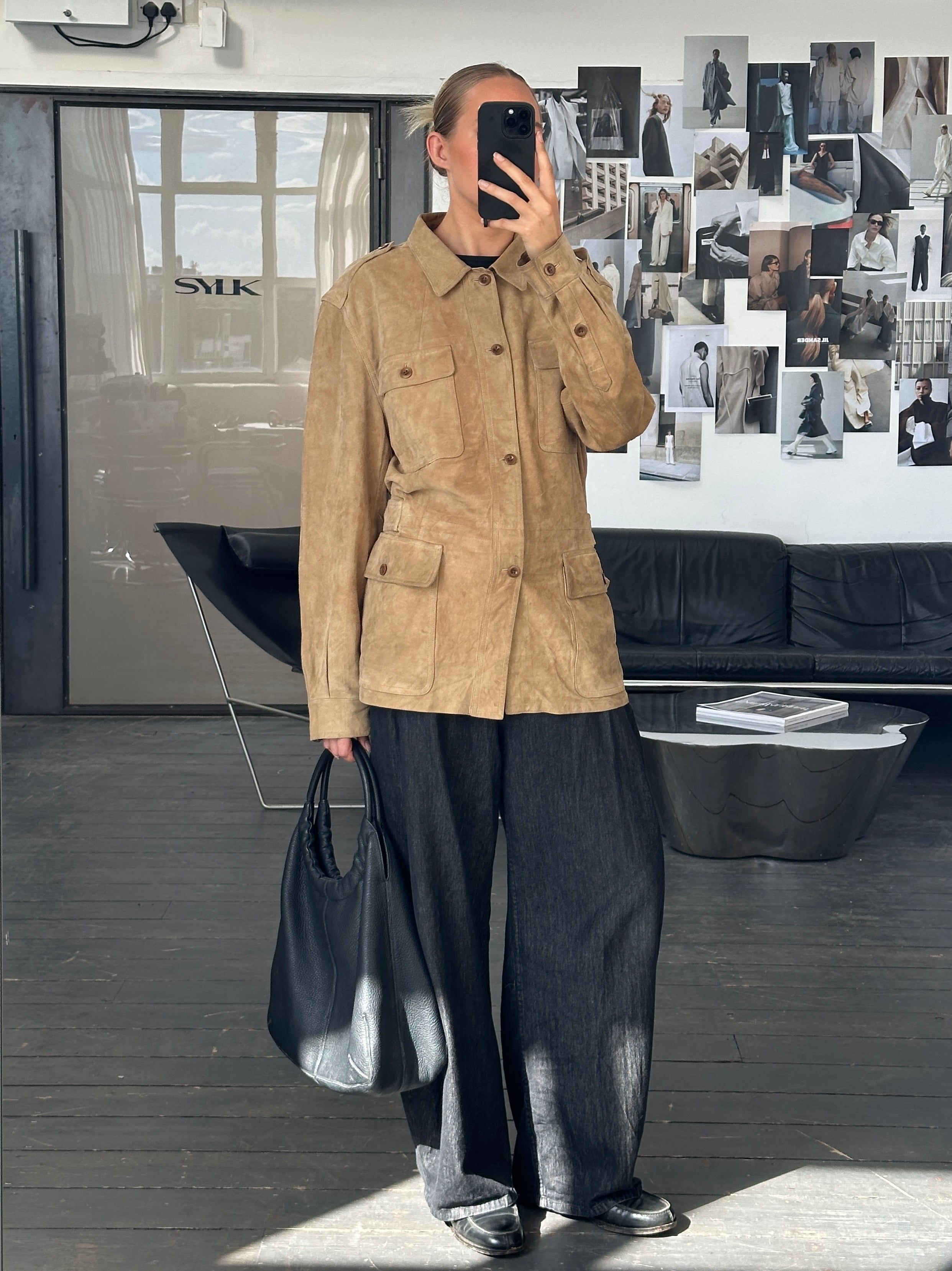 Ralph Lauren Polo 2000s safari suede jacket in XL, tan color, featuring classic collar and button details, displayed on a hanger.