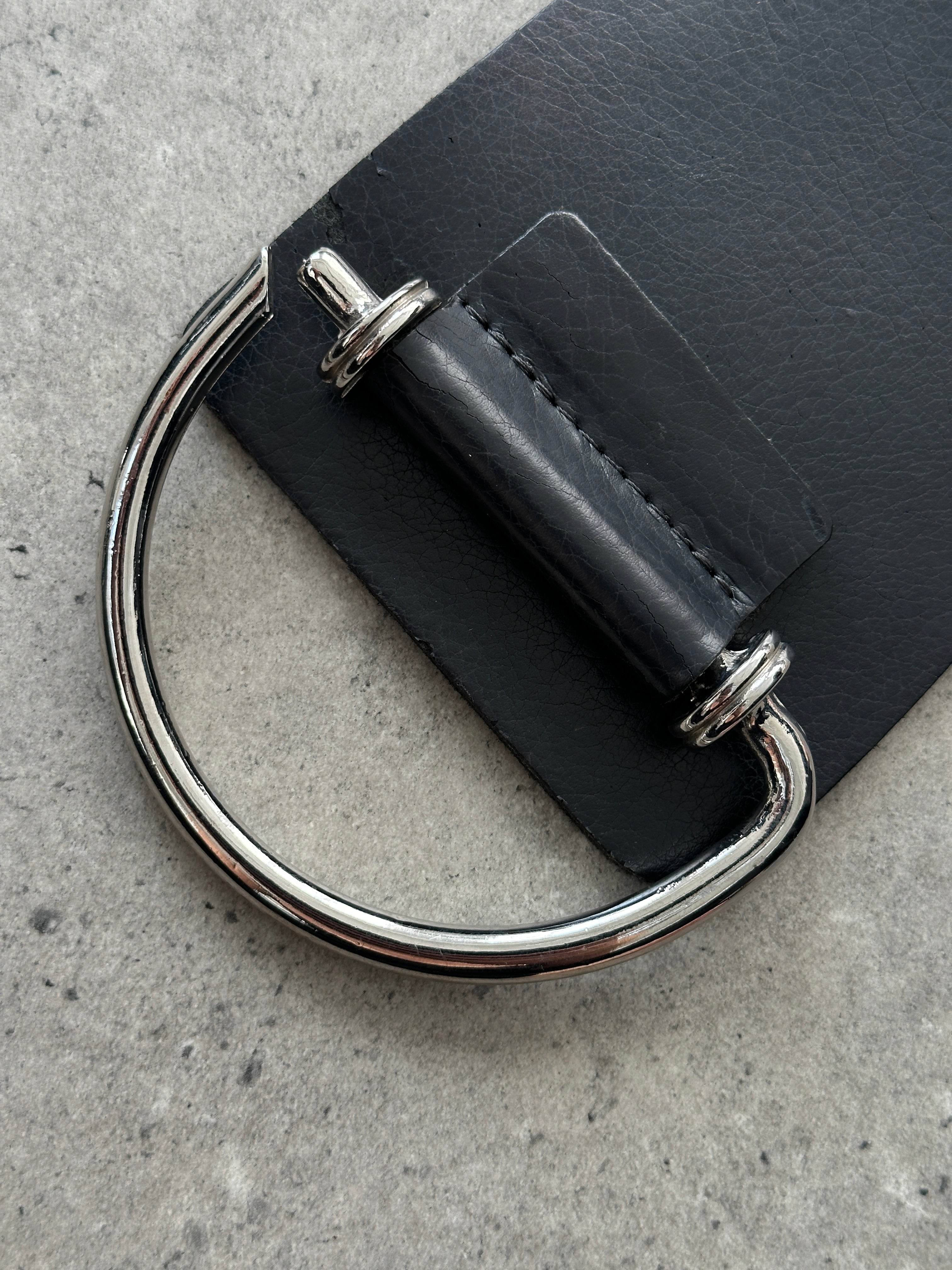 Vintage chrome D-ring leather hip belt with chunky design, adjustable W36-W38, featuring a stylish vintage brand buckle.