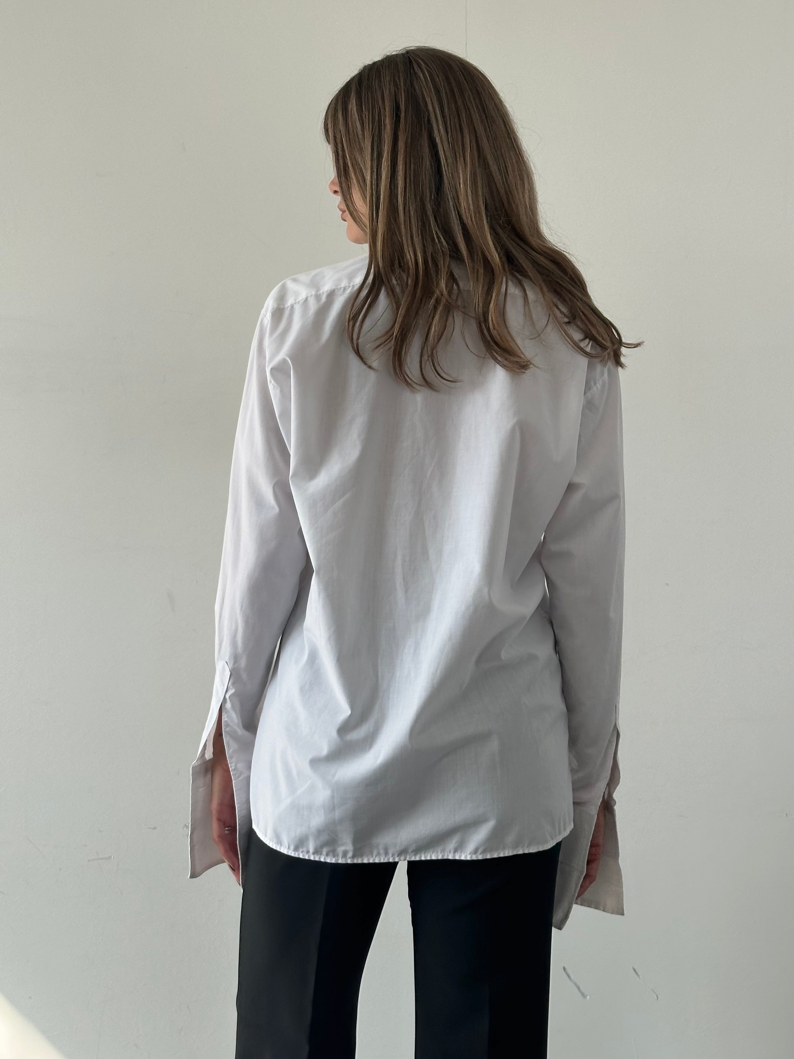 Vintage brand vintage cotton tuxedo dress shirt in size large, displayed flat with collar and button details.