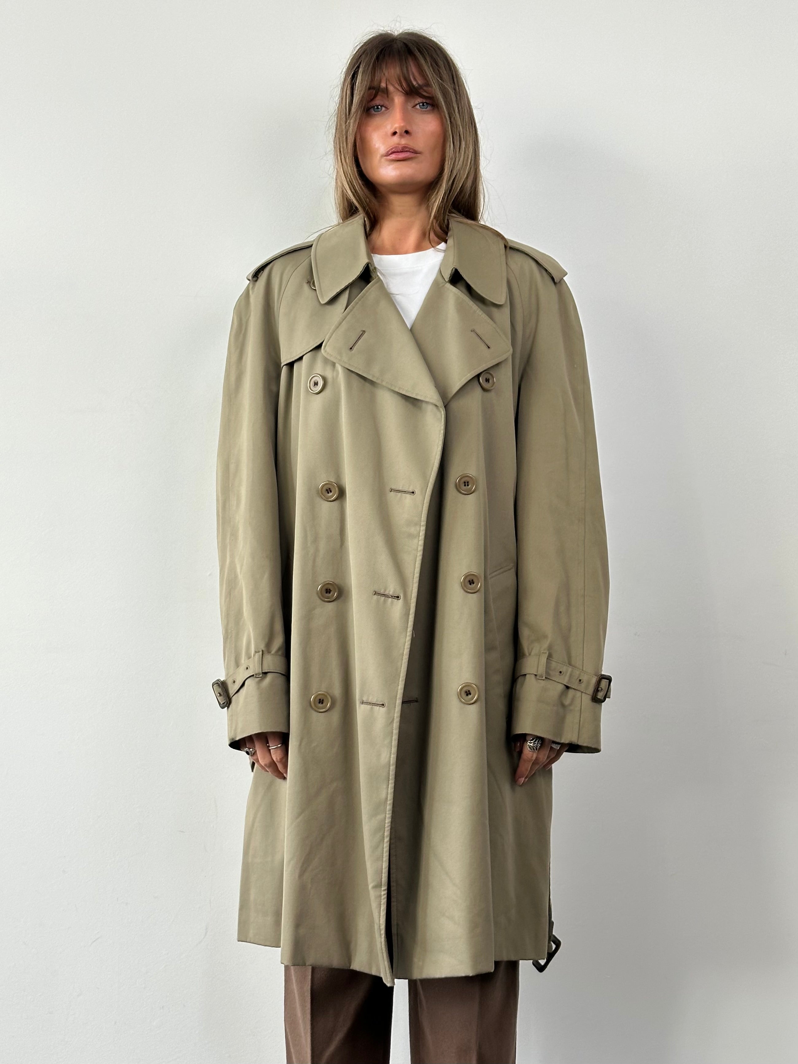 Aquascutum pure cotton double-breasted belted trench coat in XL, shown on a hanger with classic beige fabric and button details.