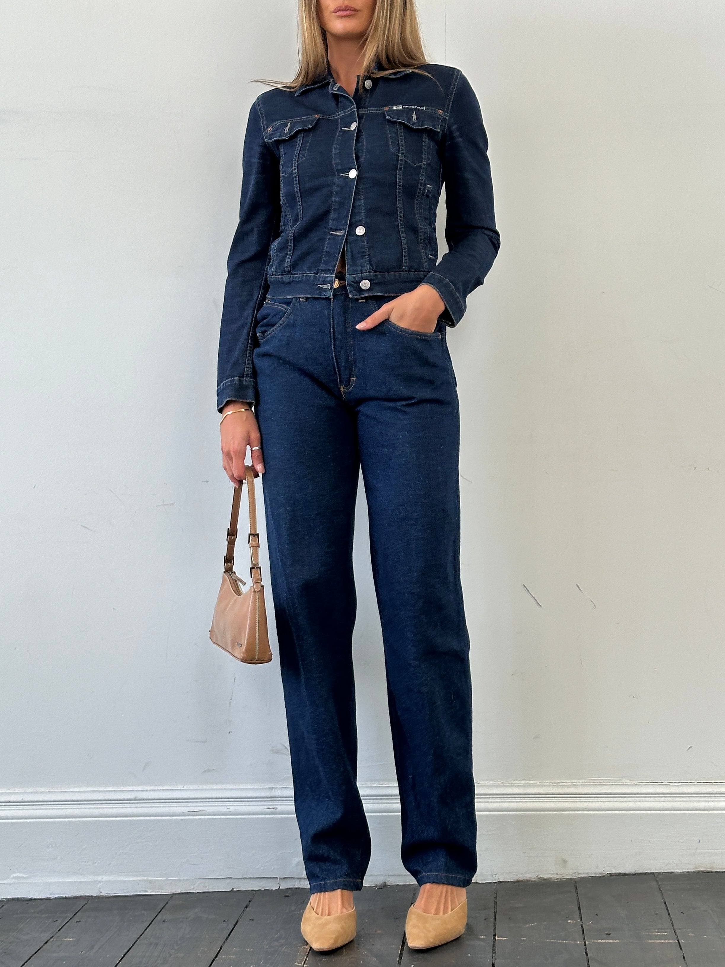 Vintage high waisted straight leg denim jeans, size W26, with classic blue wash and five-pocket design.