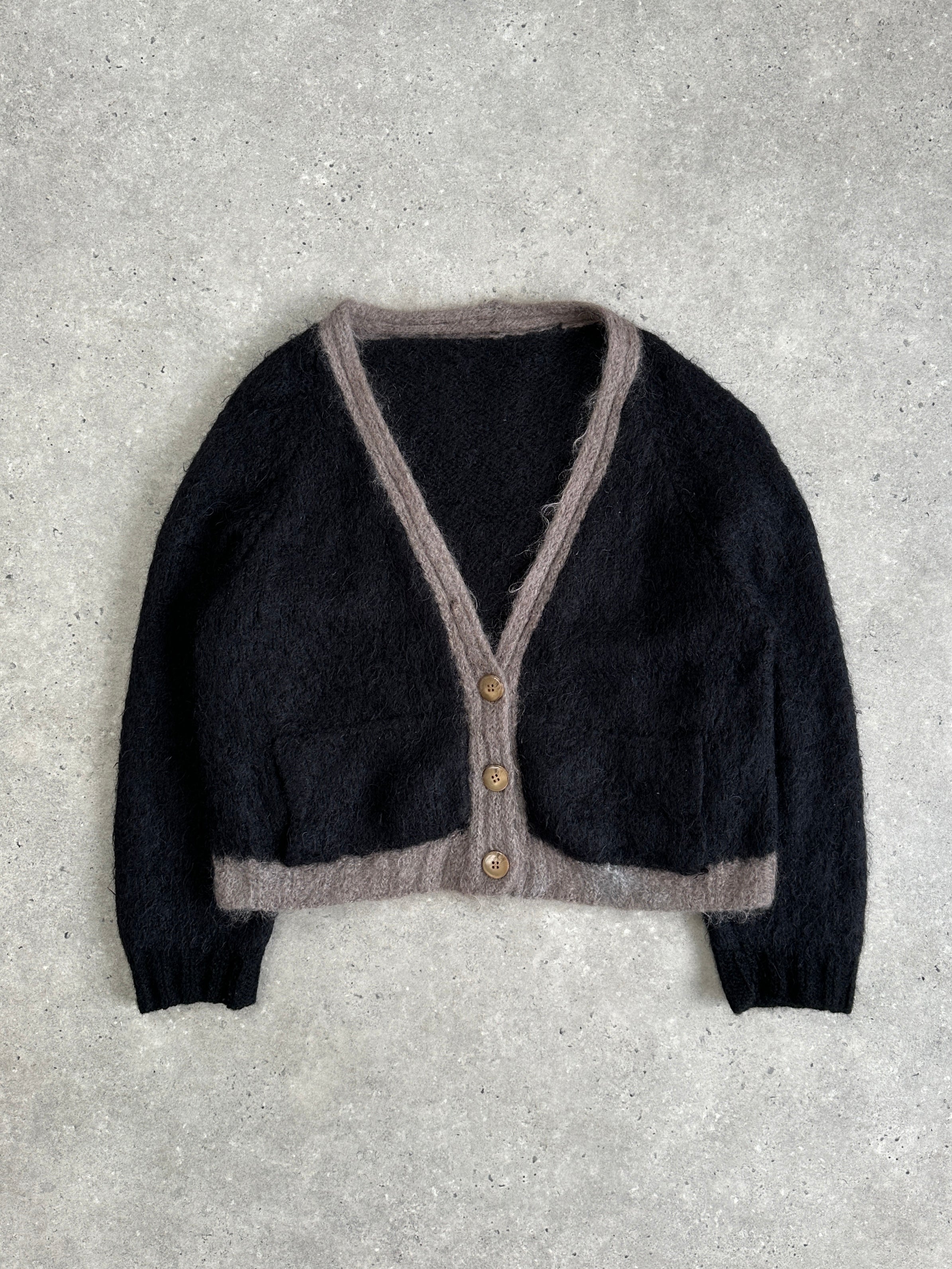 Vintage mohair wool fuzzy cardigan in size large, featuring a cozy, textured knit with a vintage-inspired design.