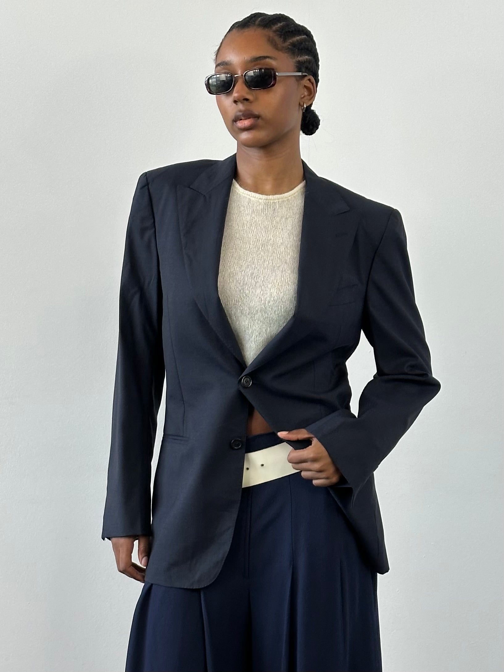 Yves Saint Laurent Rive Gauche 1990s pure wool blazer in size 36R/M, tailored fit with classic lapel and button closure.