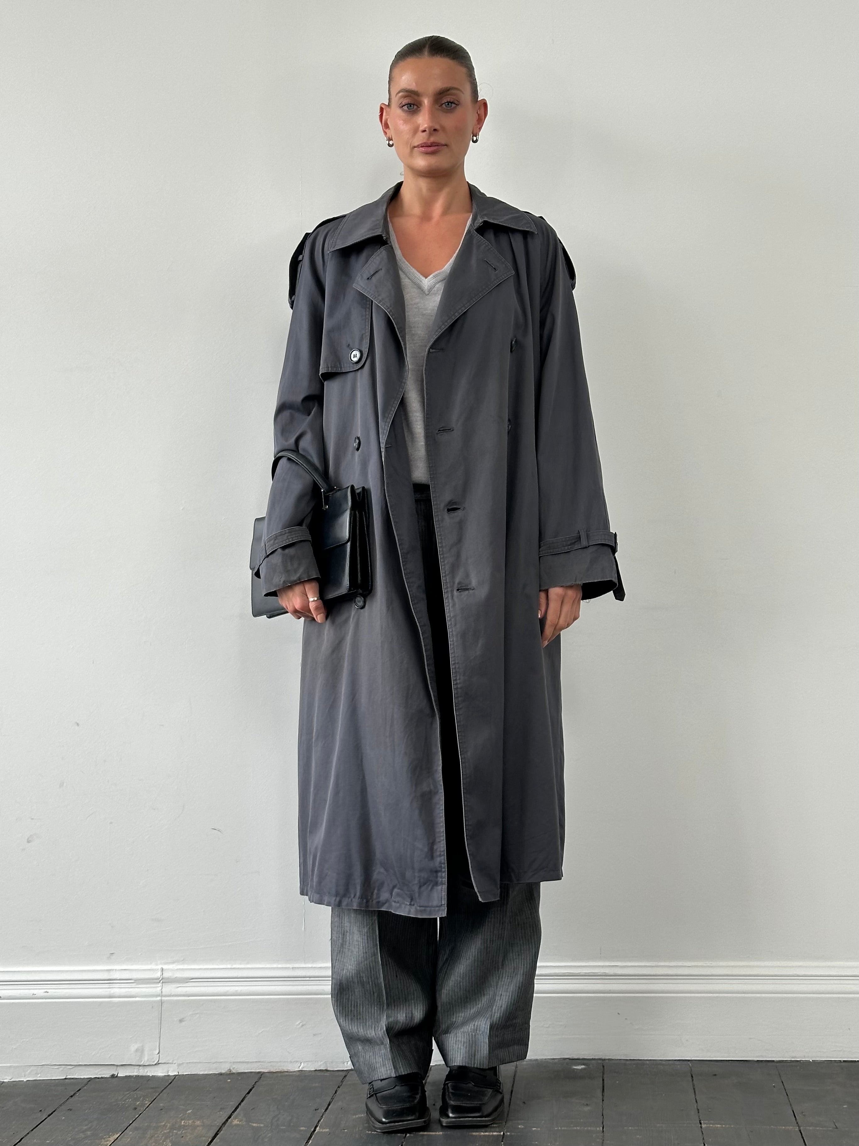 Yves Saint Laurent cotton double-breasted belted trench coat in size XL, beige color, shown on a mannequin.
