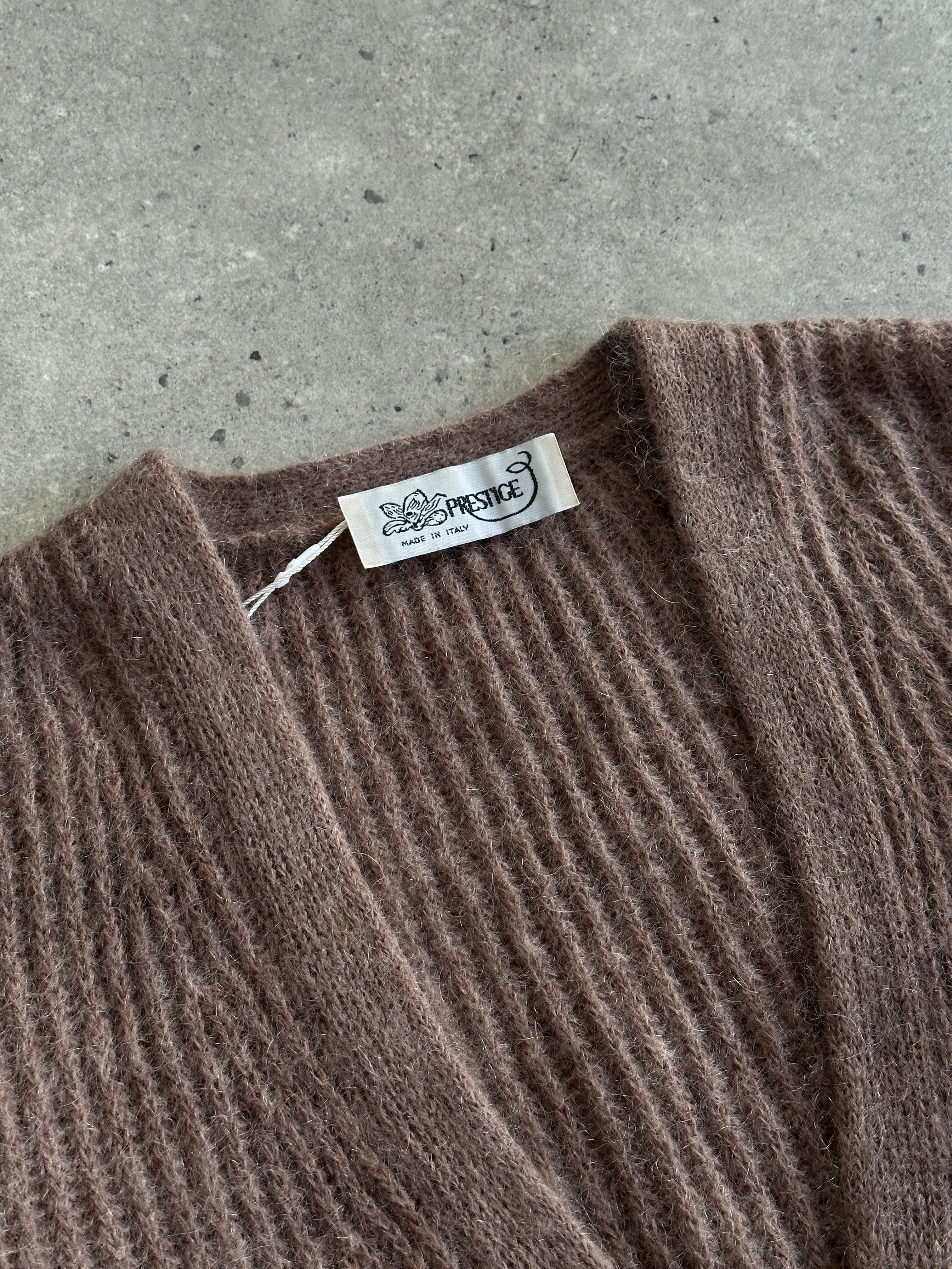 Vintage Italian fuzzy mohair cardigan in size L, featuring a cozy, textured knit with a classic vintage style.