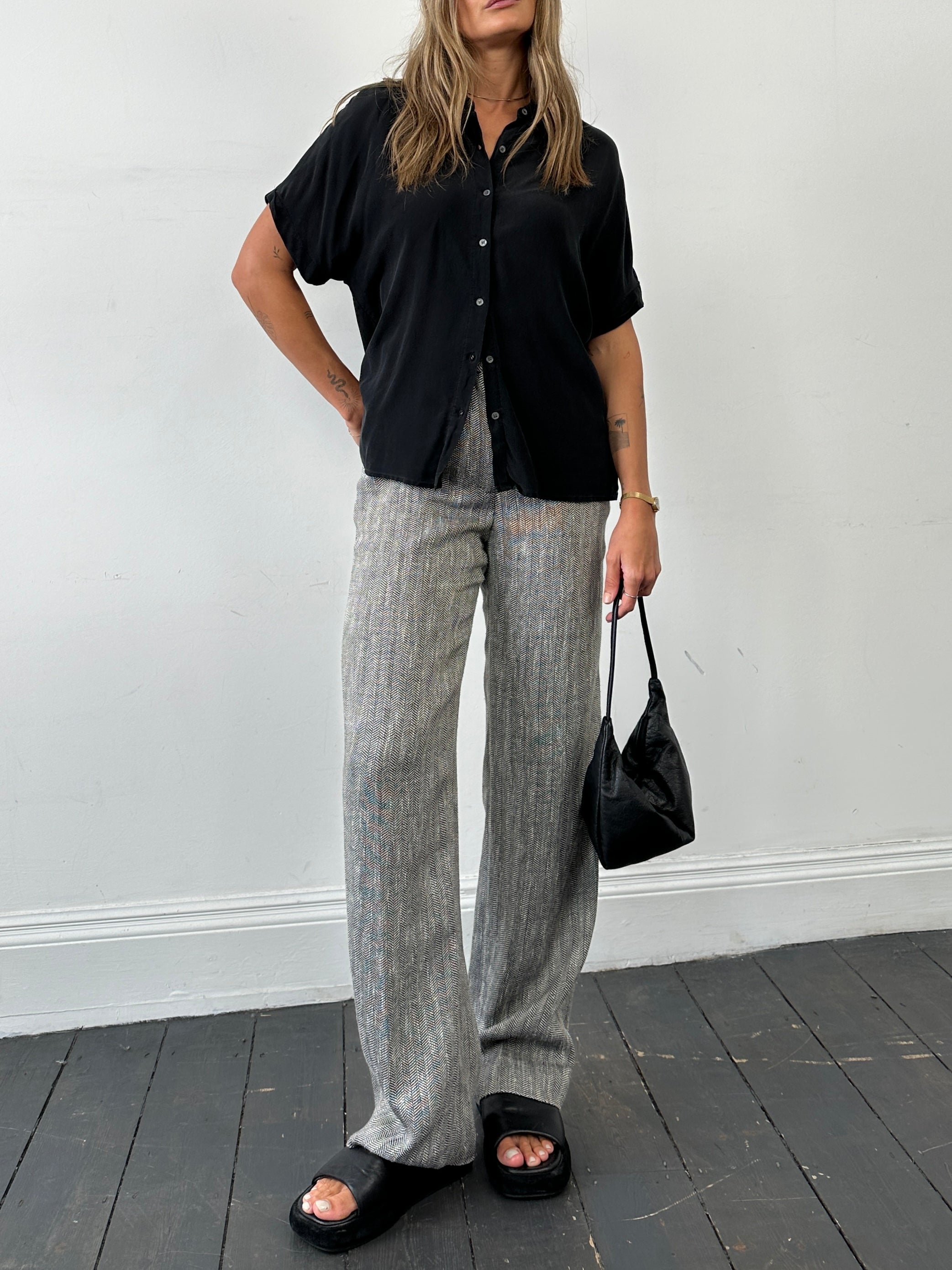 Max Mara cotton linen herringbone high-waisted trousers in beige, showing front view with tailored fit and classic pattern.
