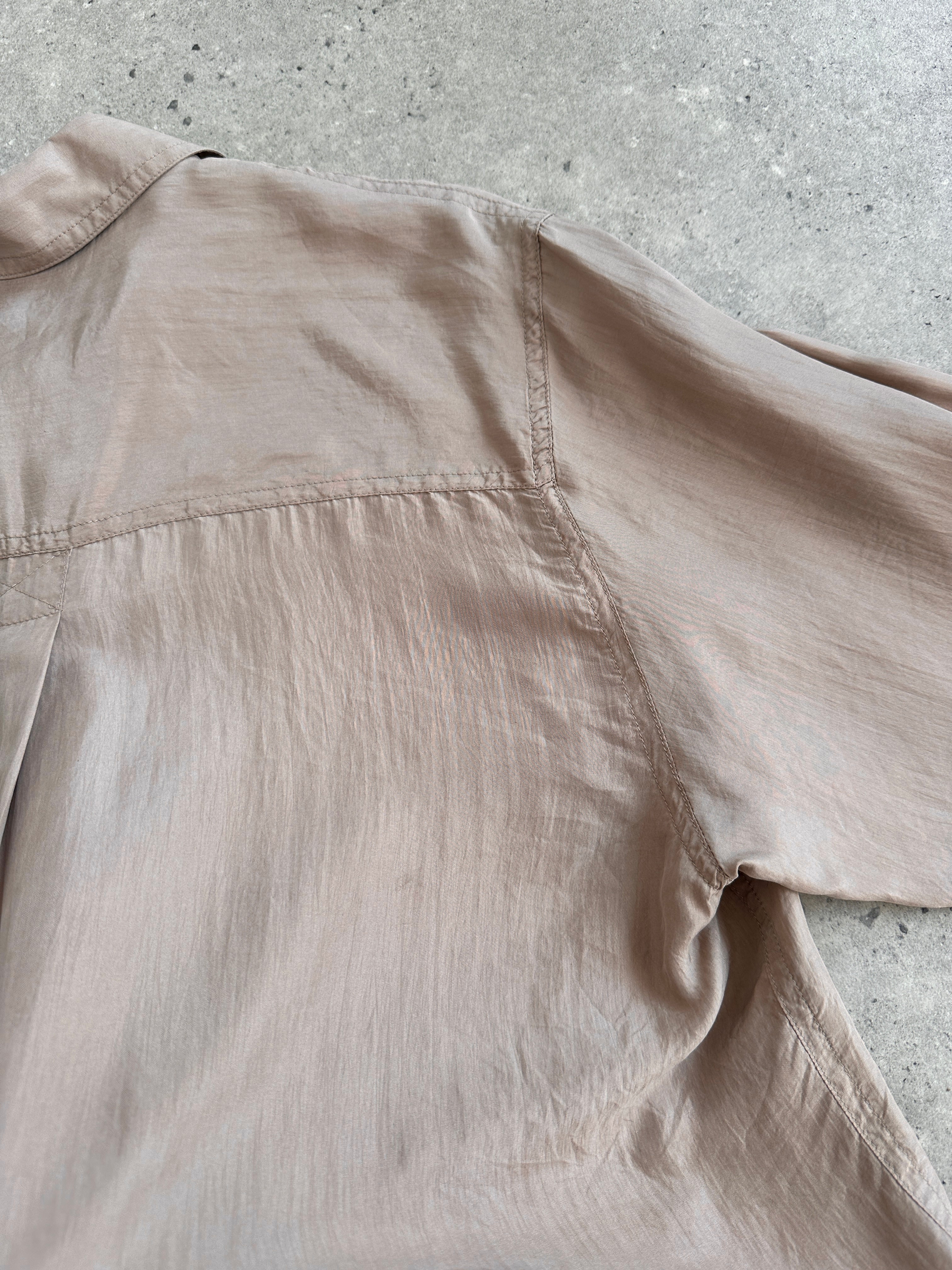 Vintage 1990s pure silk shirt in size M/L, featuring a classic design and smooth fabric, perfect for vintage fashion enthusiasts.