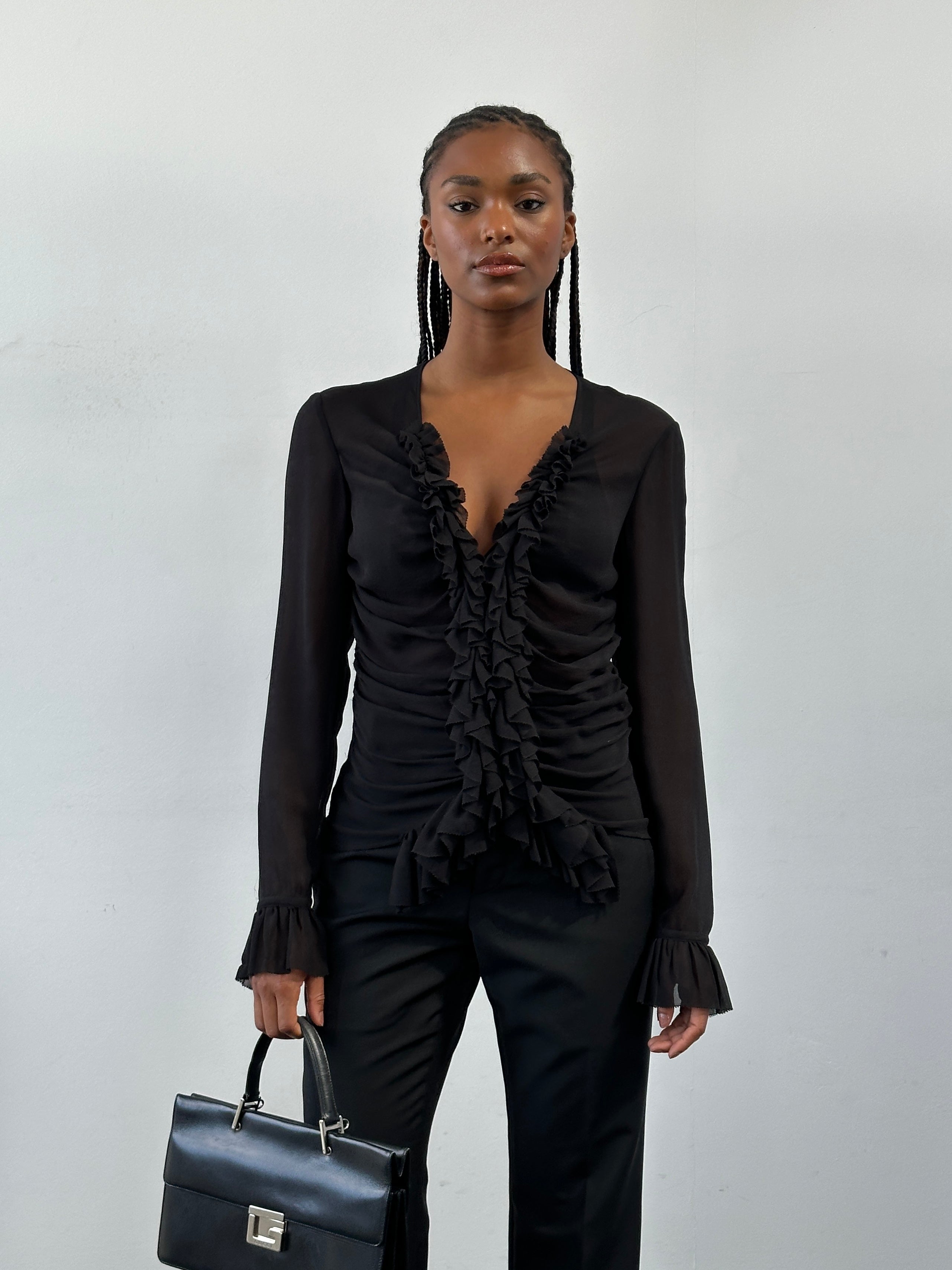 DKNY 2000s pure silk ruched shirt in size M, featuring a stylish gathered design and classic collar, displayed on a hanger.