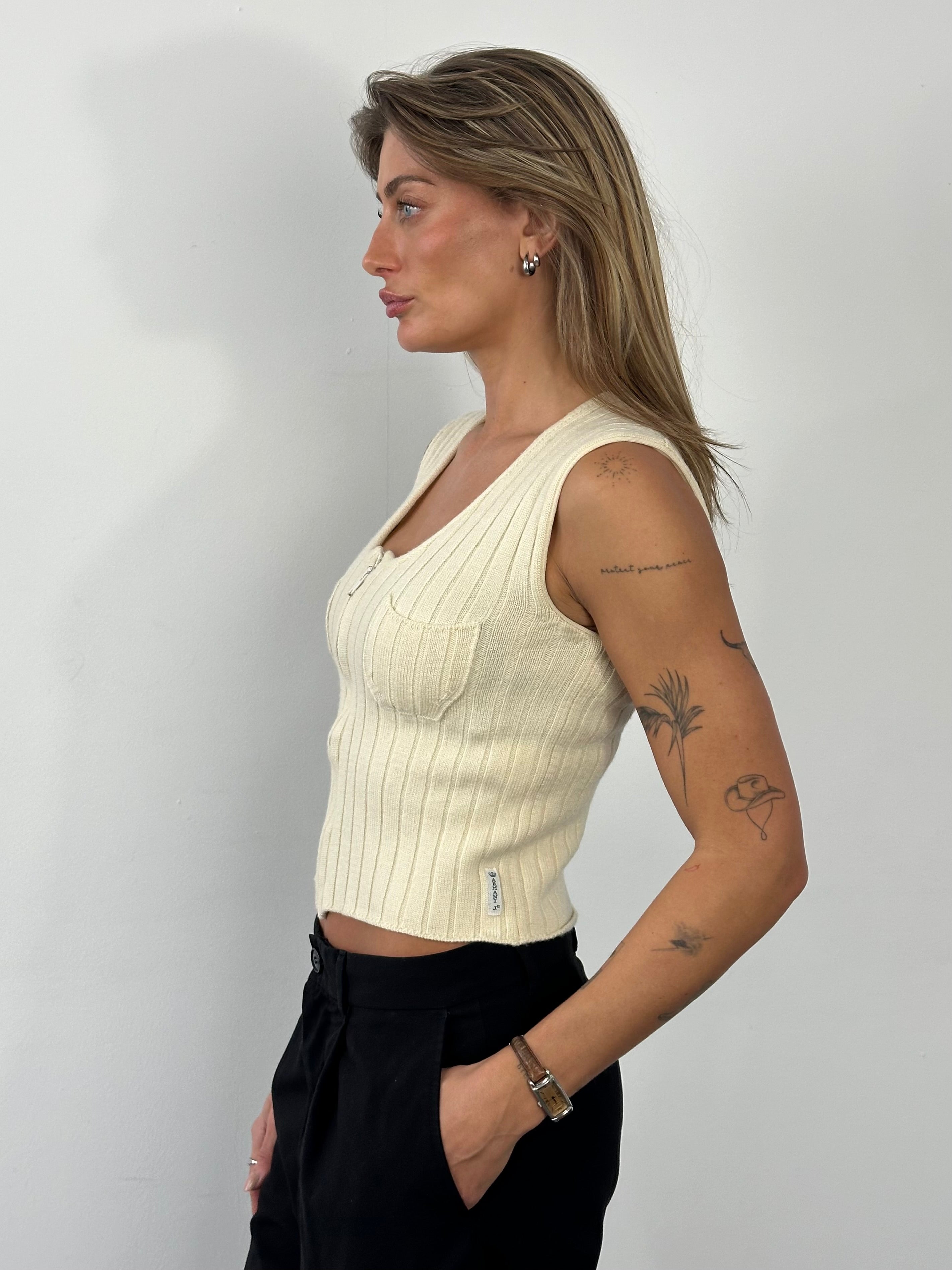 Armani Jeans 1990s pure wool knit top in XS, featuring a classic design with a textured fabric and subtle branding details.