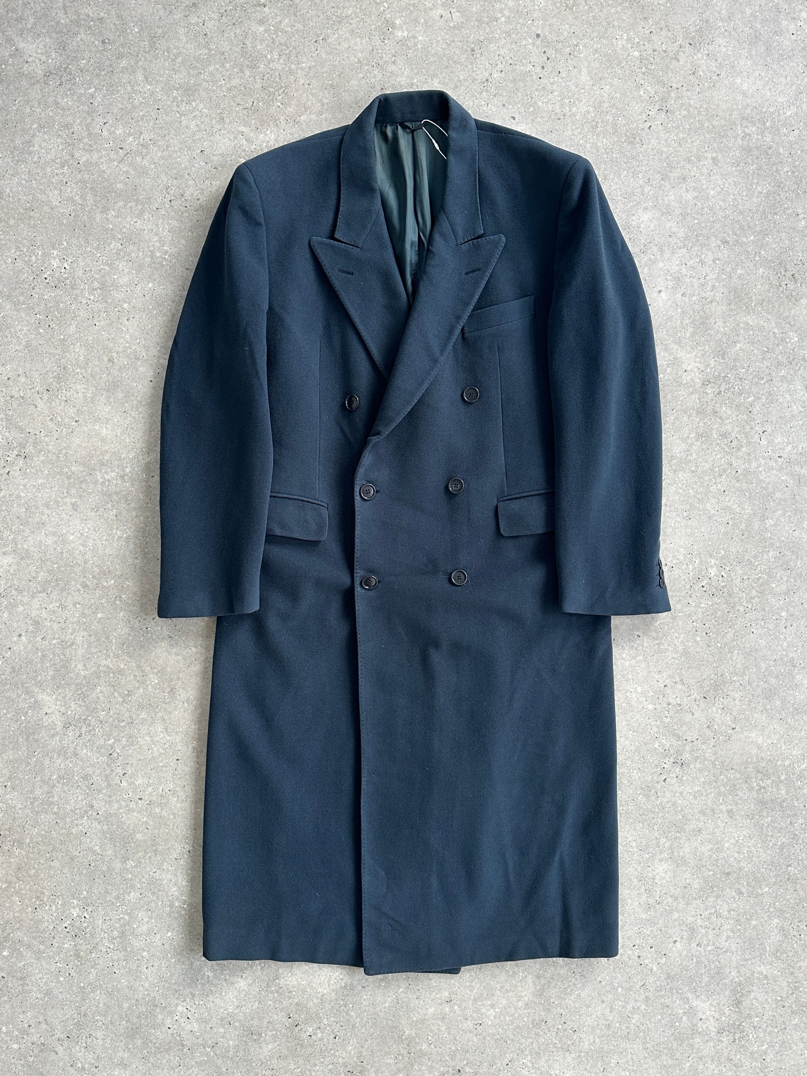 Moschino 1990s pure wool double-breasted coat in XL/XXL, featuring a classic design with wide lapels and a tailored fit.