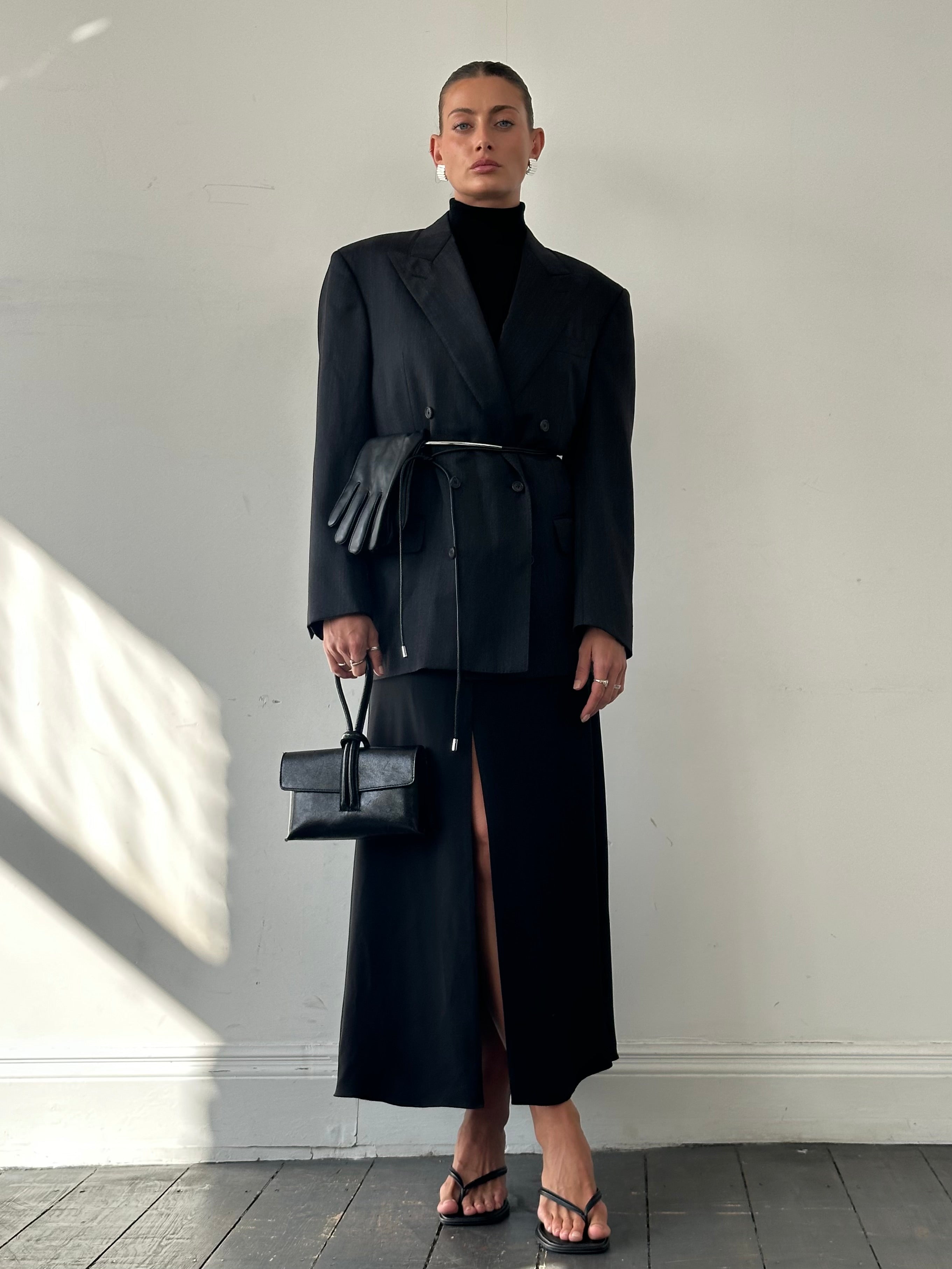 Giorgio Armani SS2023 pure silk split front A-line maxi skirt in W26, showcasing elegant design and smooth silk fabric.