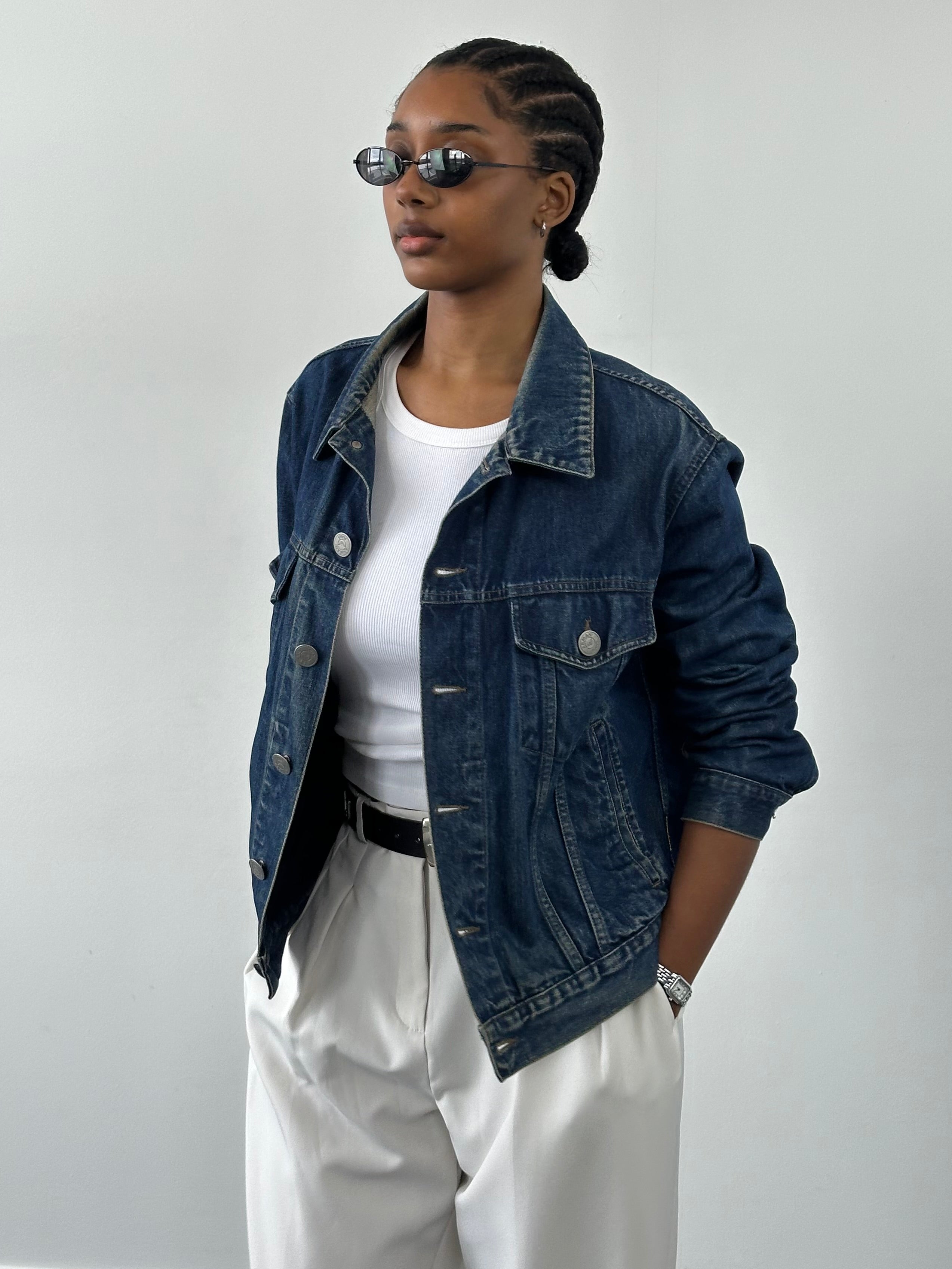 Armani Jeans 1900s mid wash denim jacket, male size M/L, front view showing classic fit and stylish design details.