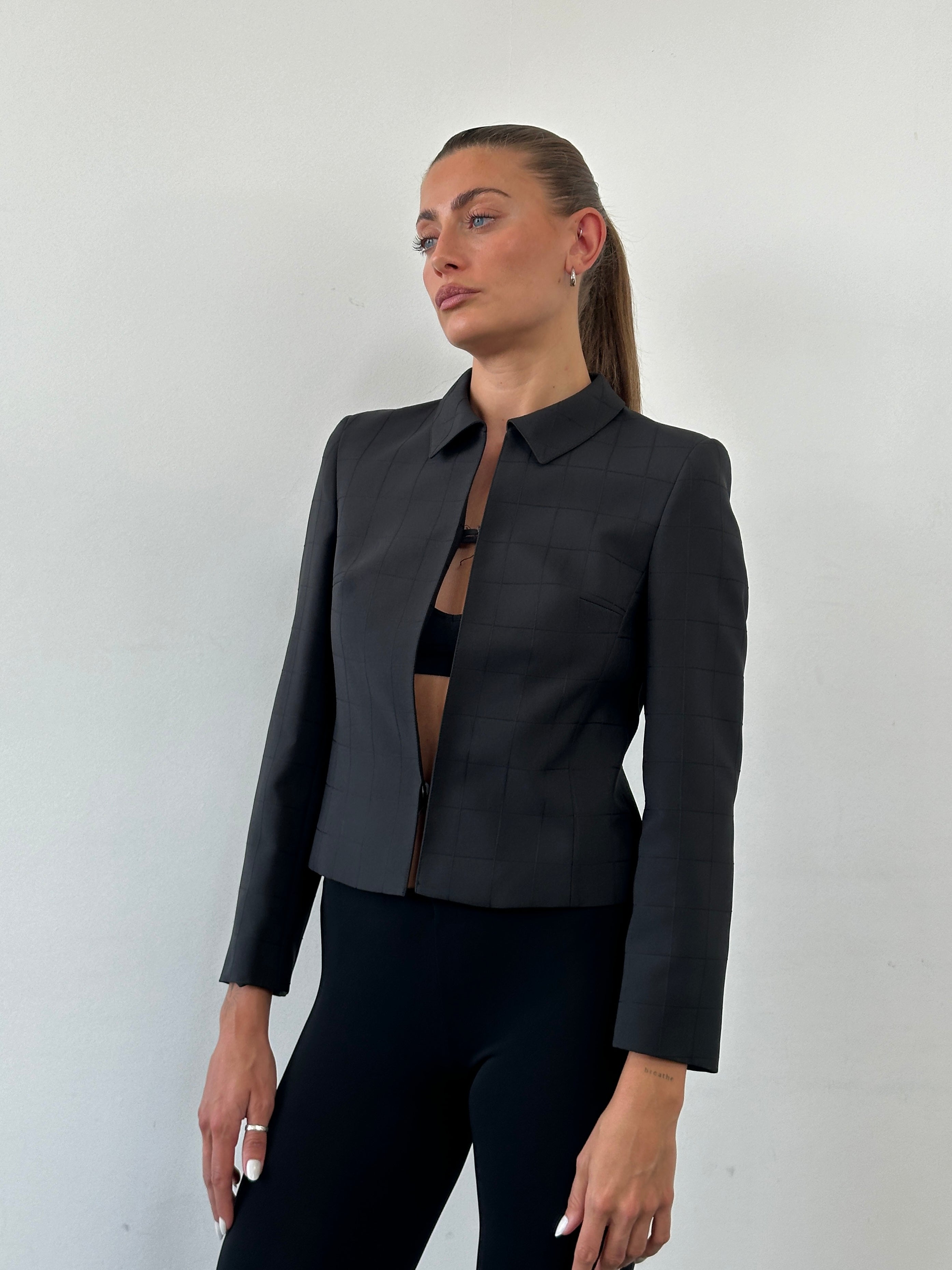 Vintage 80s minimal cropped check blazer in size S, featuring classic tailored design and bold check pattern.