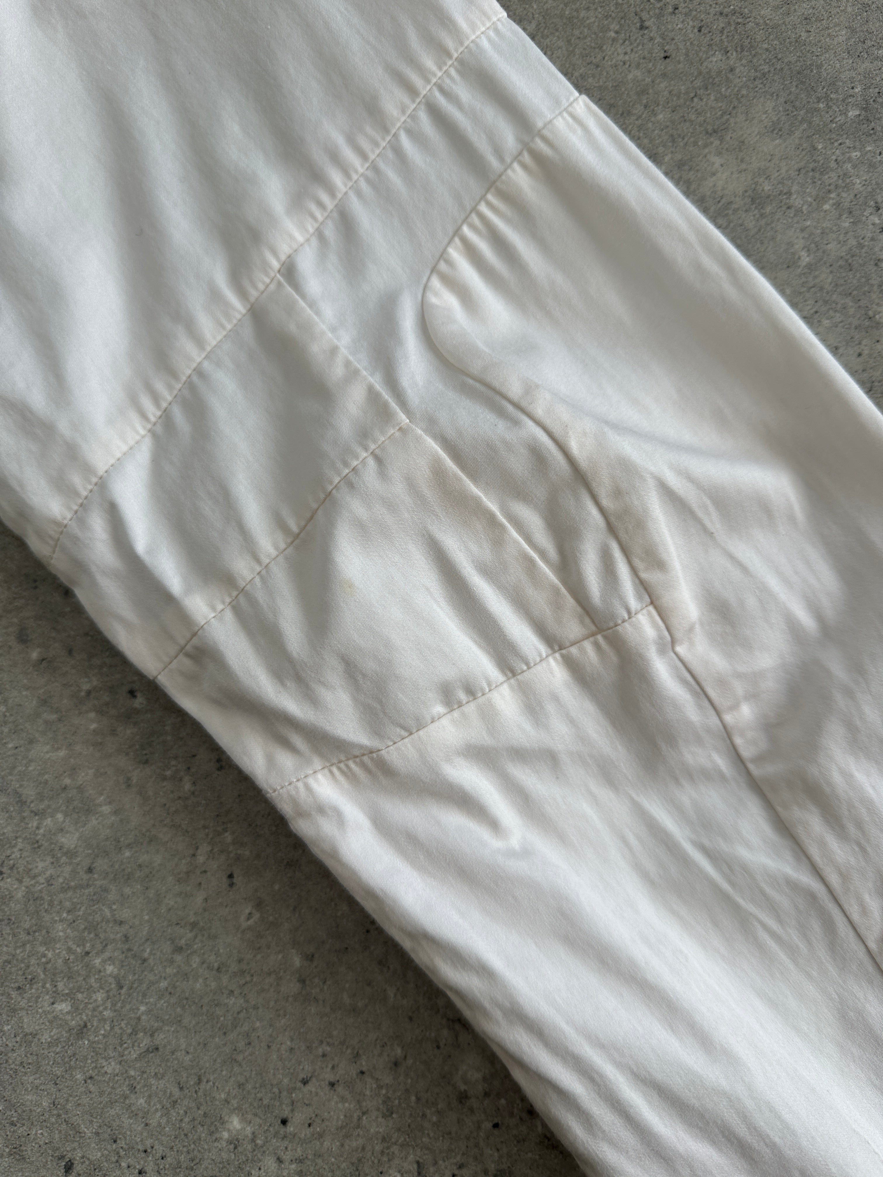 Versace Sport 90s pure cotton shirt in size L, featuring classic design and Versace branding, displayed on a hanger.