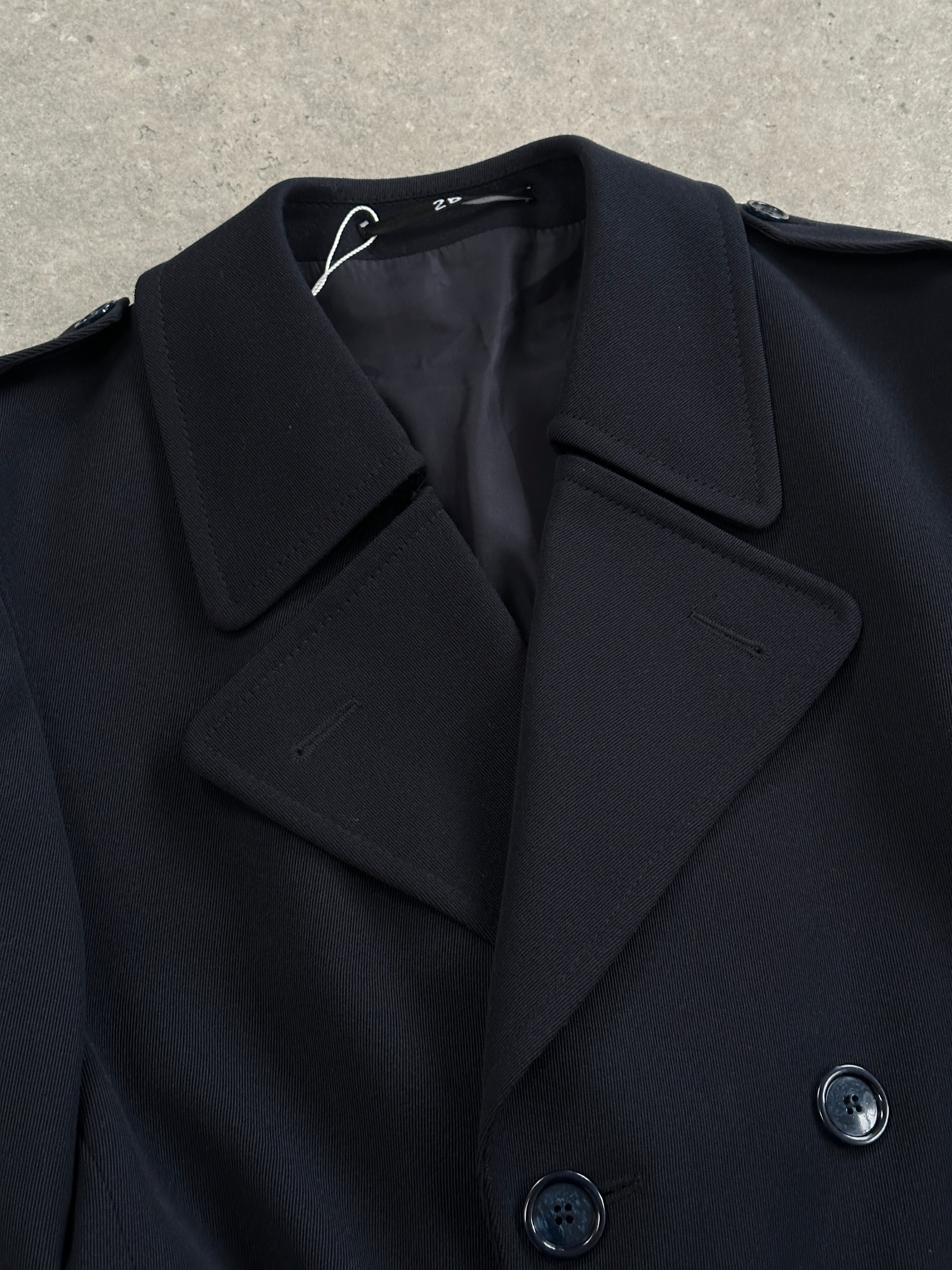 Vintage brand wool twill belted trench coat in XL, showcasing classic design with a tailored fit and timeless style.