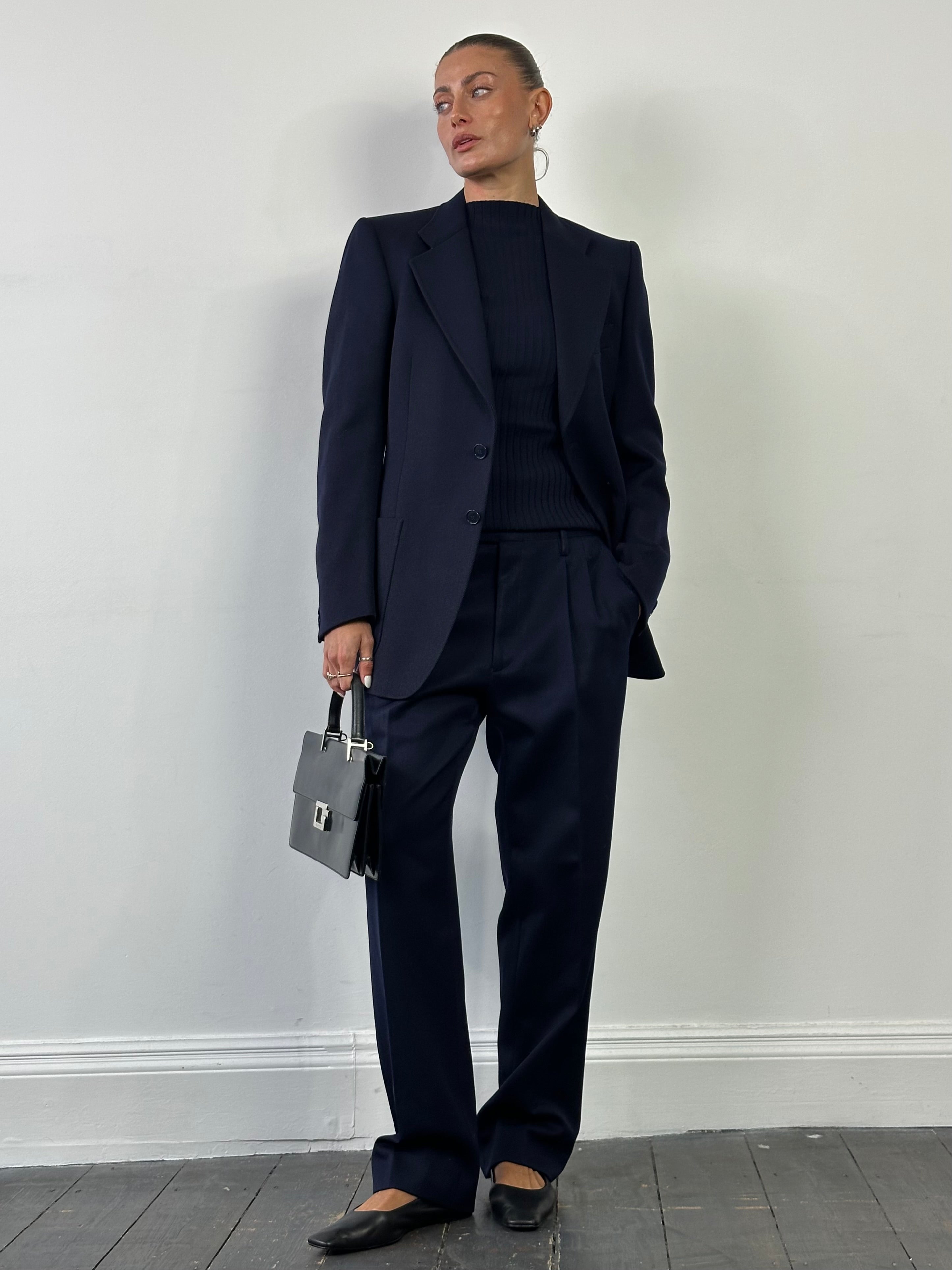 Vintage Italian vintage pure wool tailored trousers in size W32, featuring classic design and tailored fit.