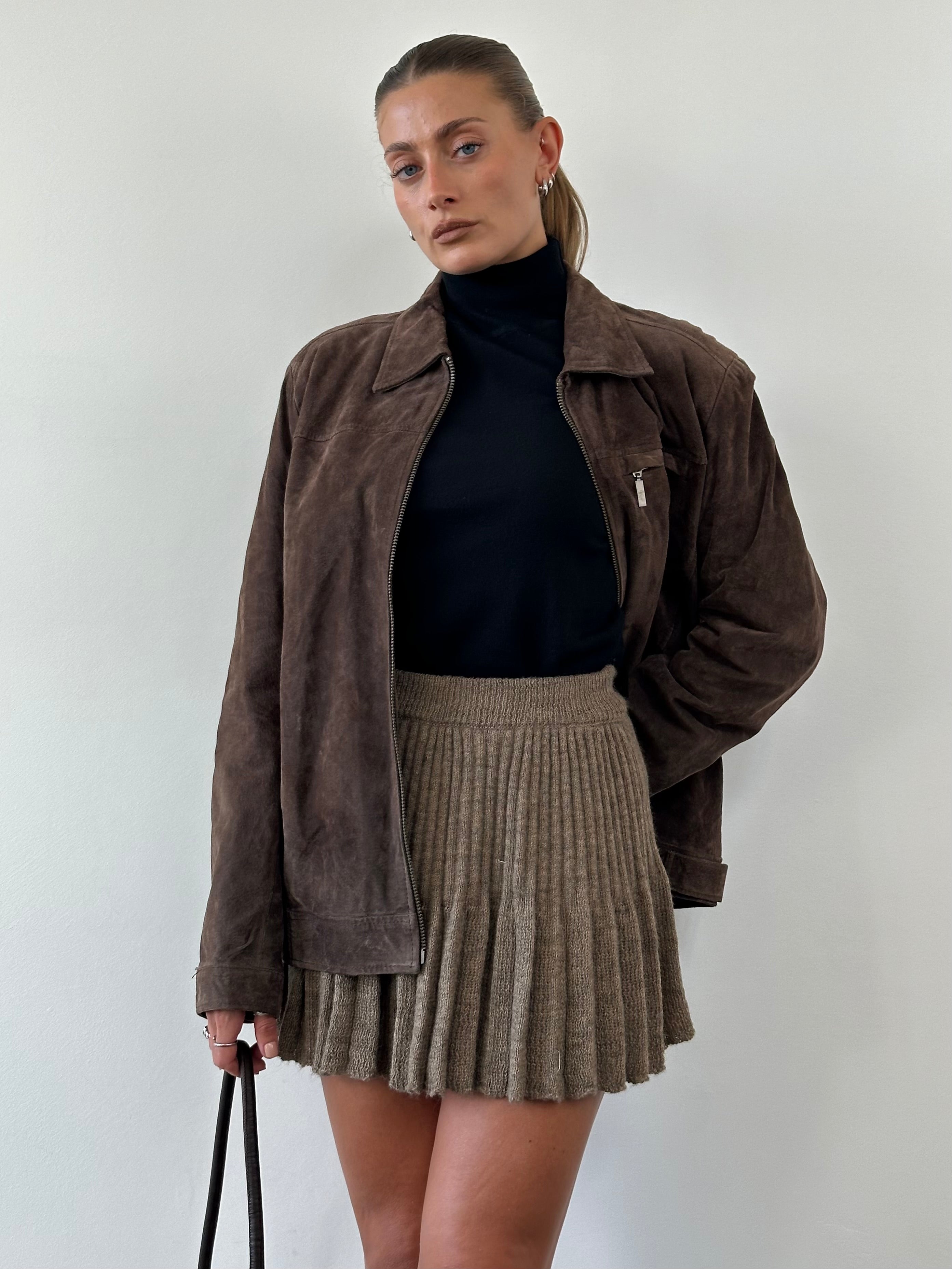 Vintage Italian vintage mohair blend pleated skirt in size S/M, showing the soft fabric and flowing pleats.
