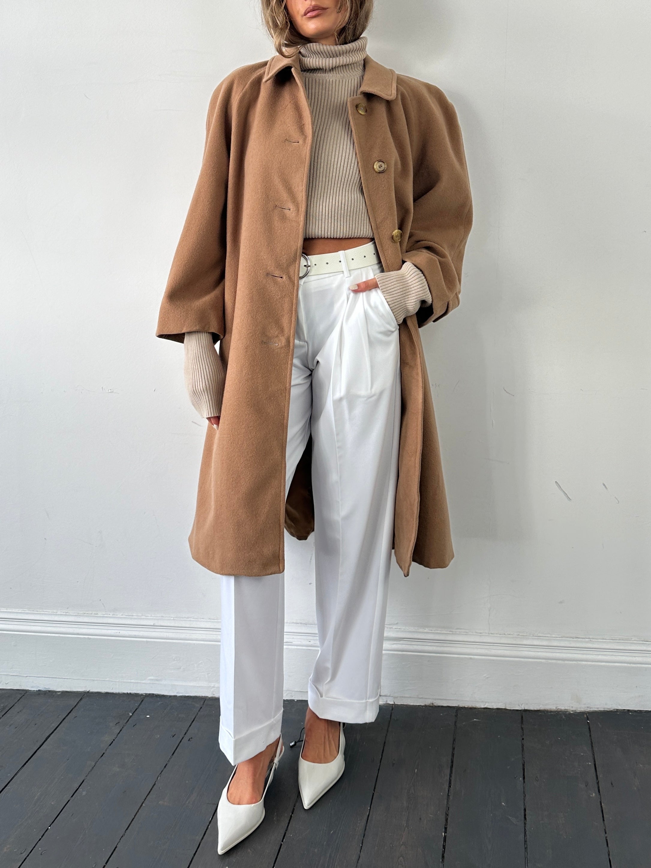 Burberry camel wool and camel hair single-breasted coat in size L, featuring classic tailored design and button details.