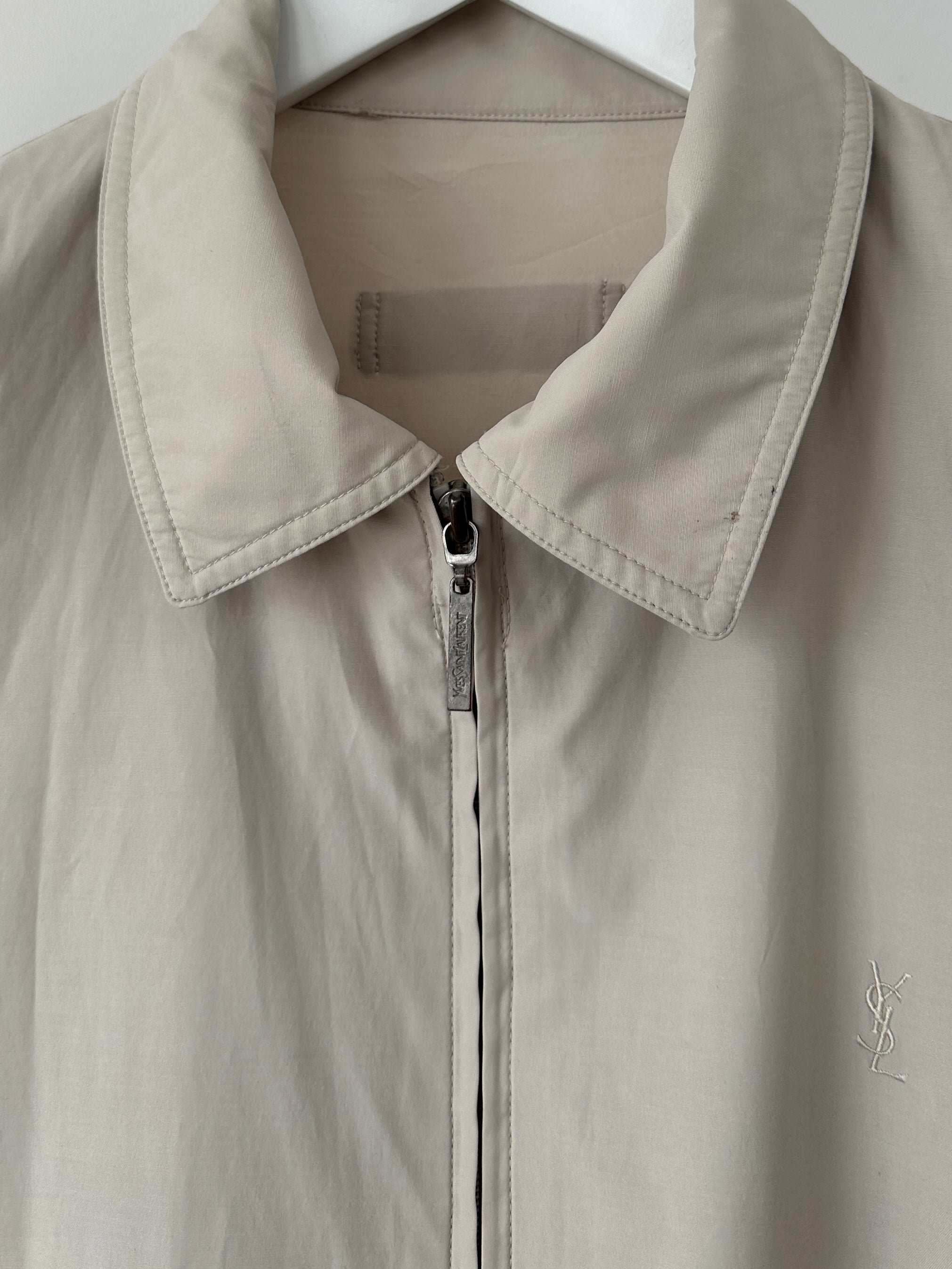 Yves Saint Laurent Pour Homme logo bomber jacket in size M/L, navy blue with front logo and ribbed cuffs and hem.