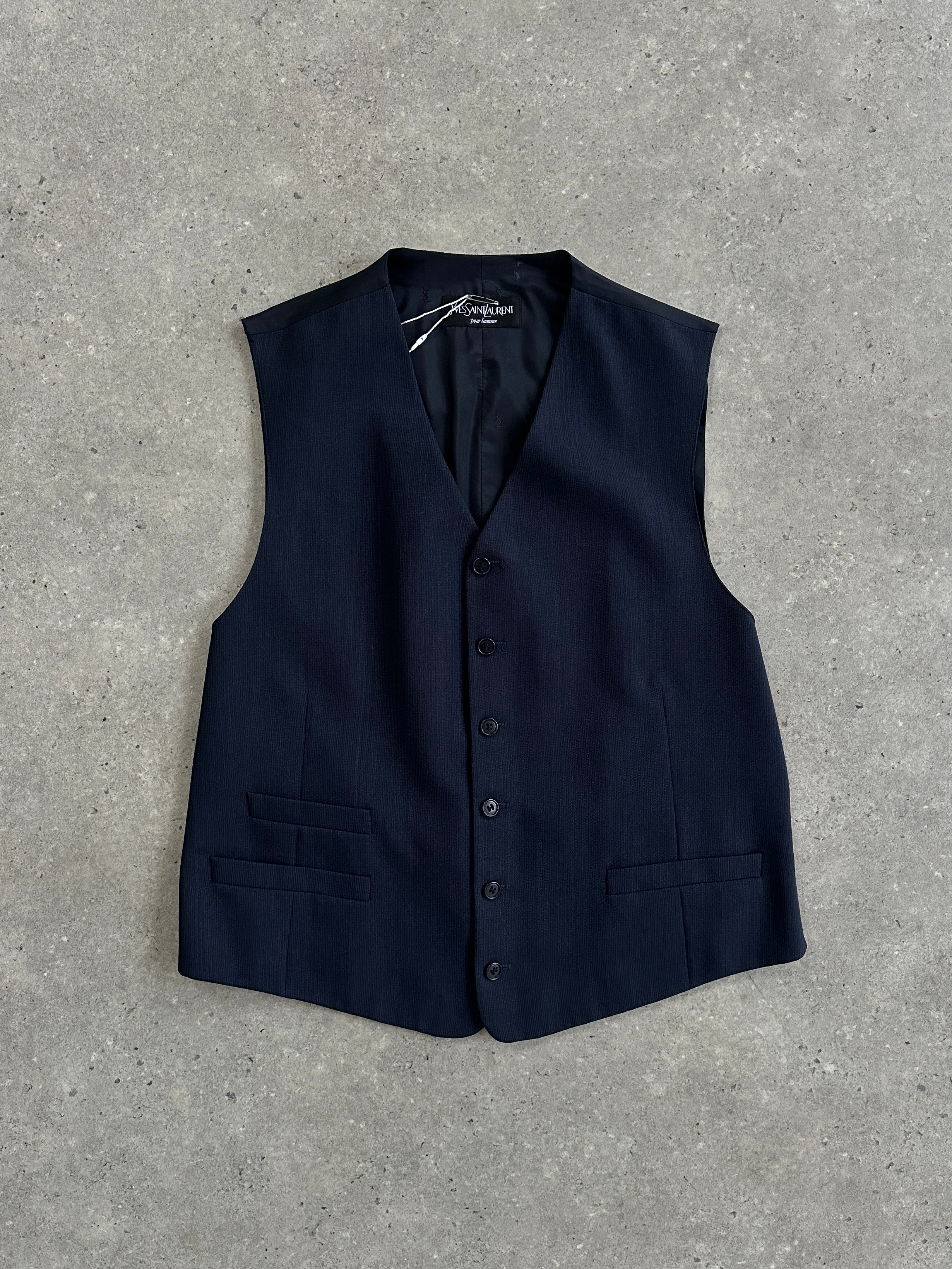 Yves Saint Laurent Pour Homme wool tailored waistcoat in size 42R/L, shown in a close-up view of the elegant, structured design.