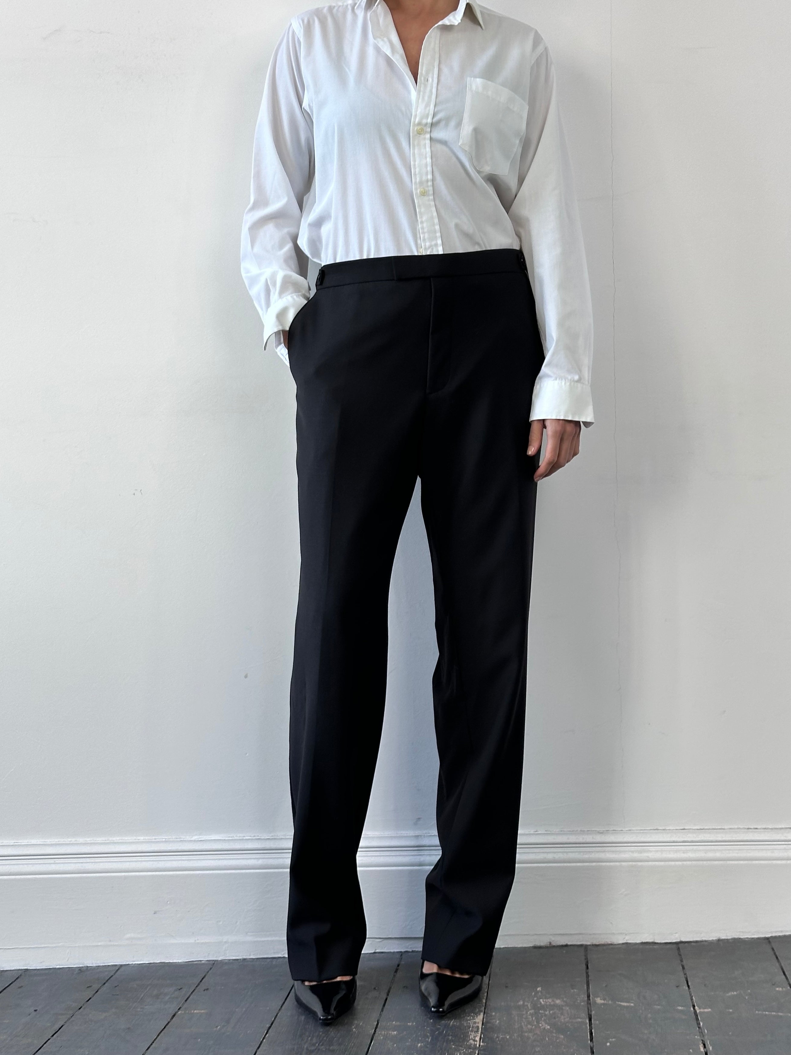 Balmain pure wool tuxedo tailored trousers in size W30-32, featuring a classic fit and sleek black fabric.