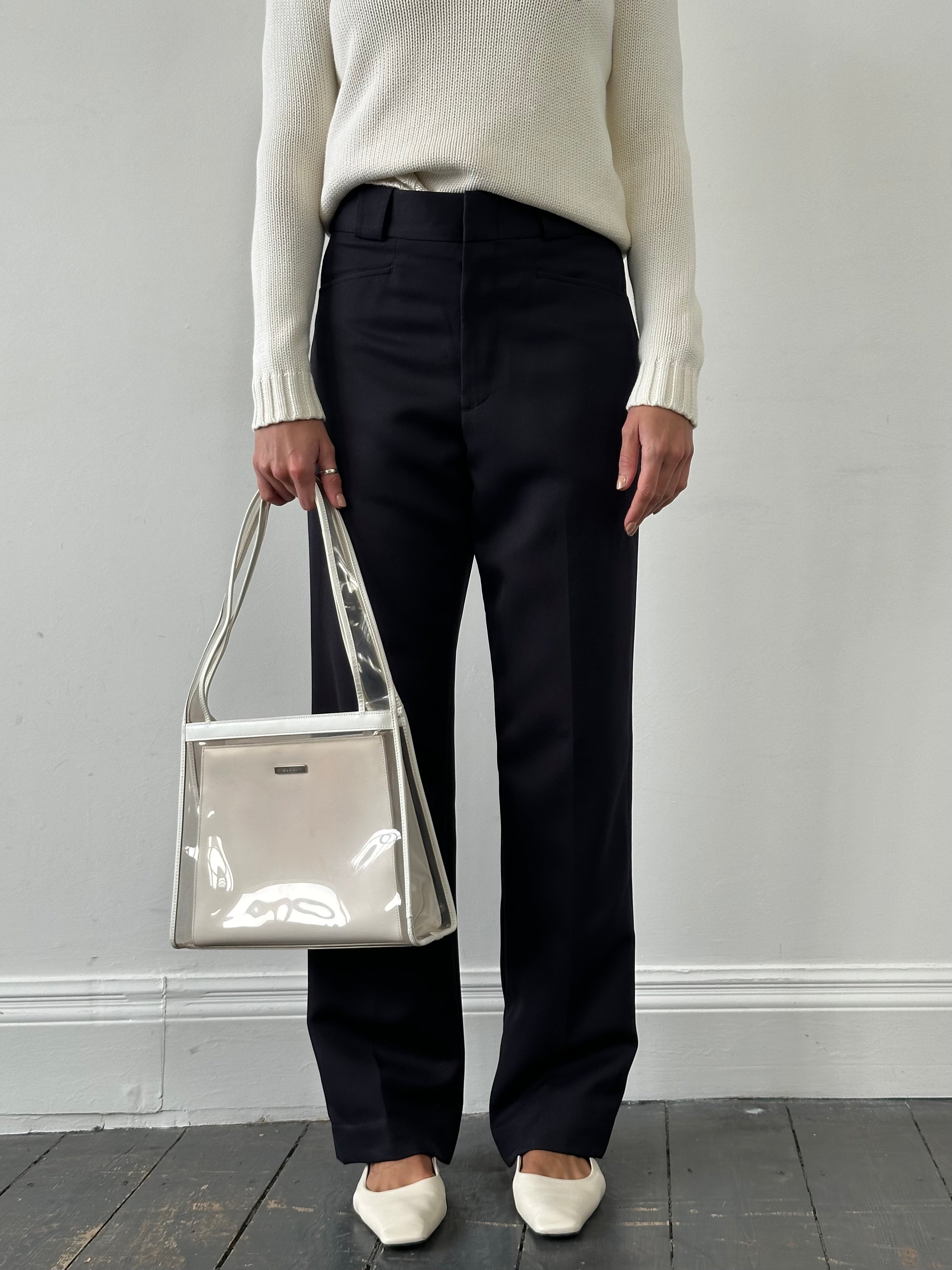 Vintage high-waisted tailored trousers with straight leg fit, W28, in classic fabric, shown on a neutral background.
