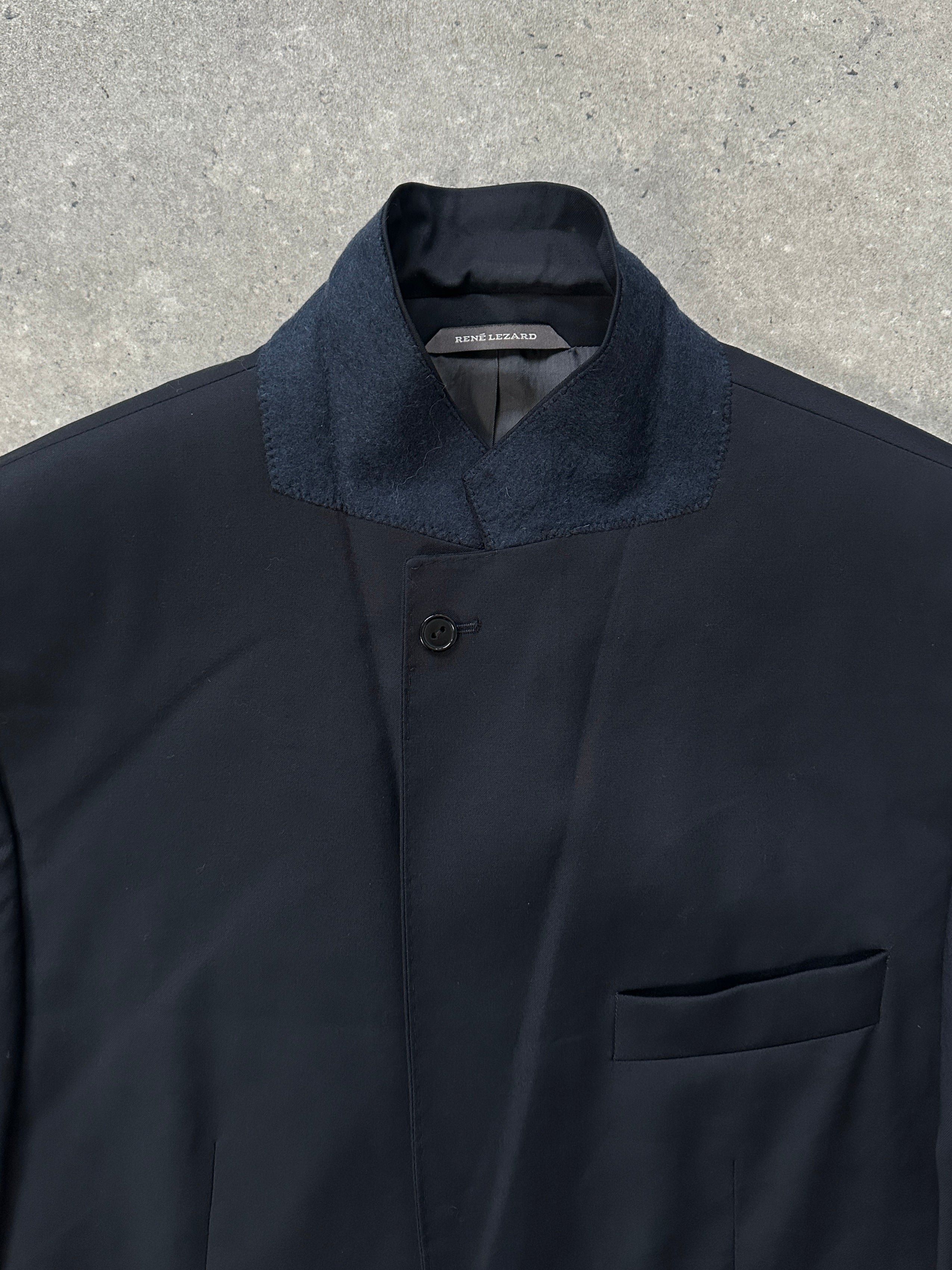 Loro Piana Rene Lezard high neck wool blazer in beige, single-breasted with tailored fit and classic lapel style.