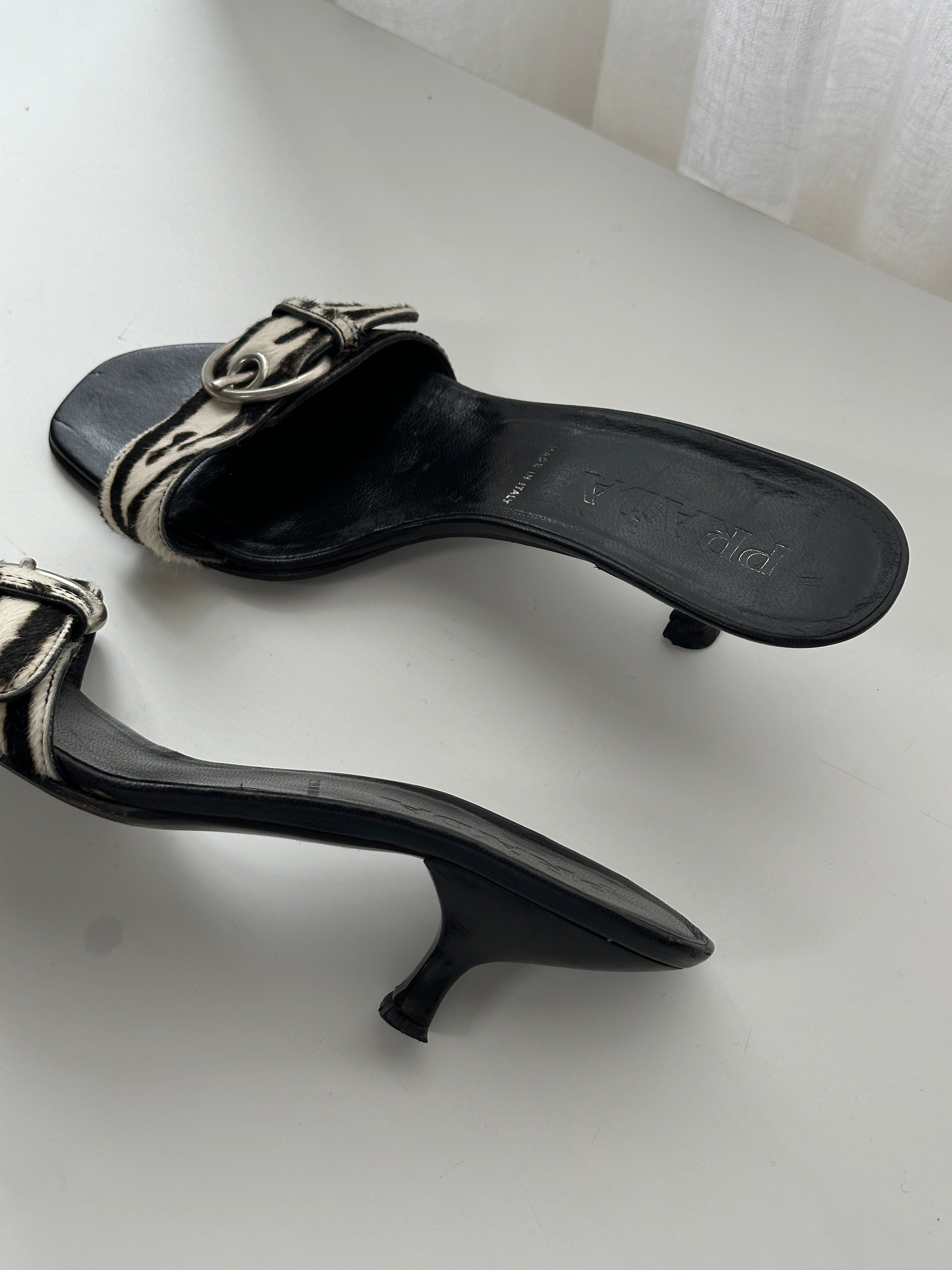 Prada zebra pony hair kitten heels in UK 4.5, featuring pointed toe and elegant design.