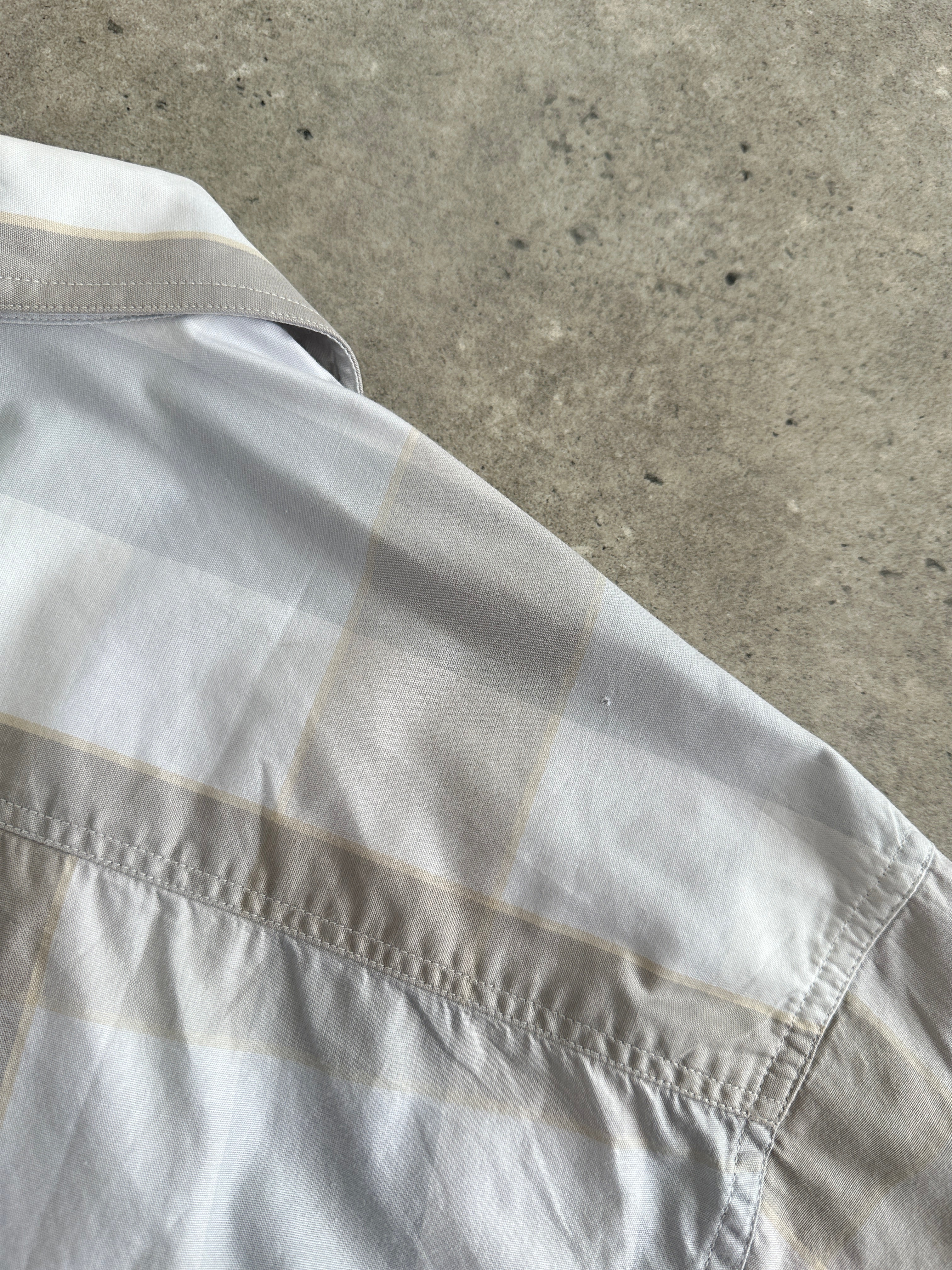 Yves Saint Laurent Pour Homme 1990s cotton check short sleeve logo shirt in XL with classic plaid pattern and YSL branding.