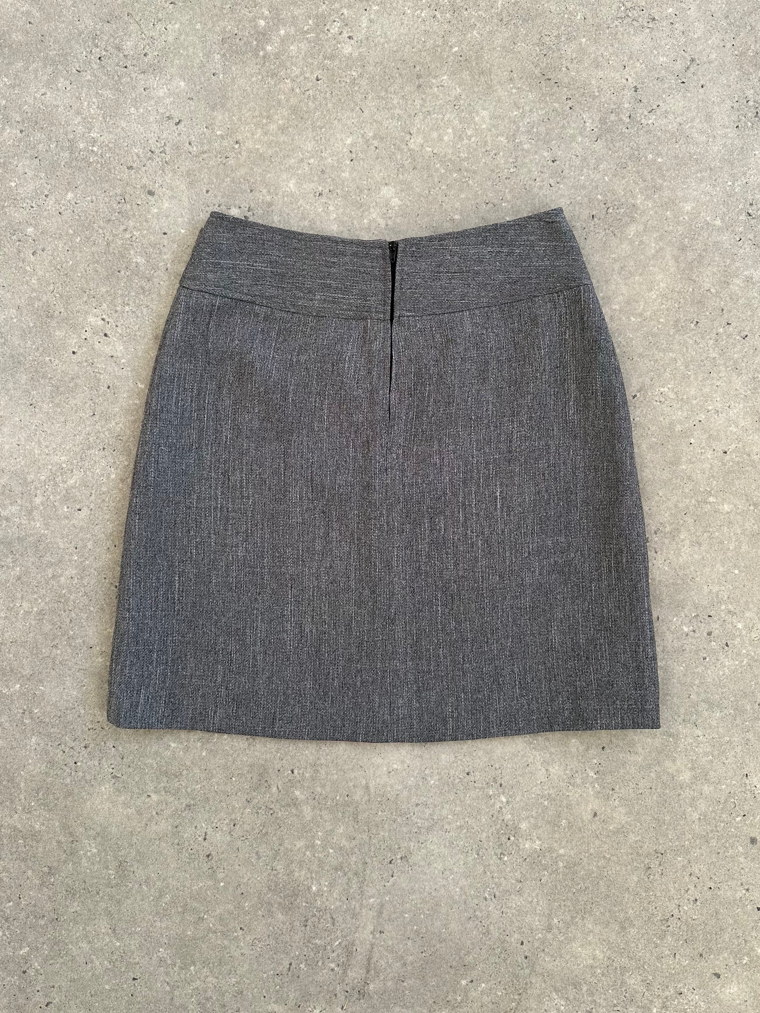 Italian vintage 1990s mini skirt by Vintage, showing a high-waisted design with classic 90s denim style.