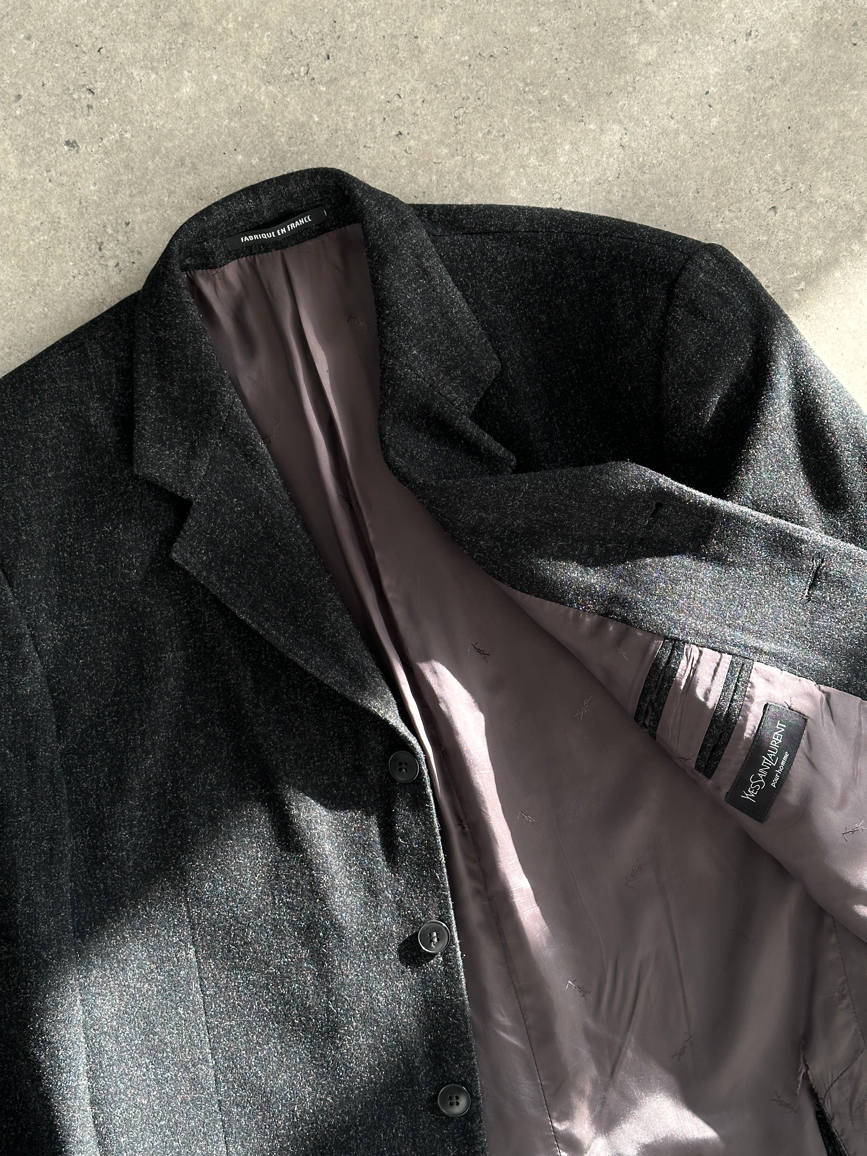 Yves Saint Laurent Pour Homme brushed wool blazer in size L/XL, tailored fit with classic lapel and textured fabric detail.