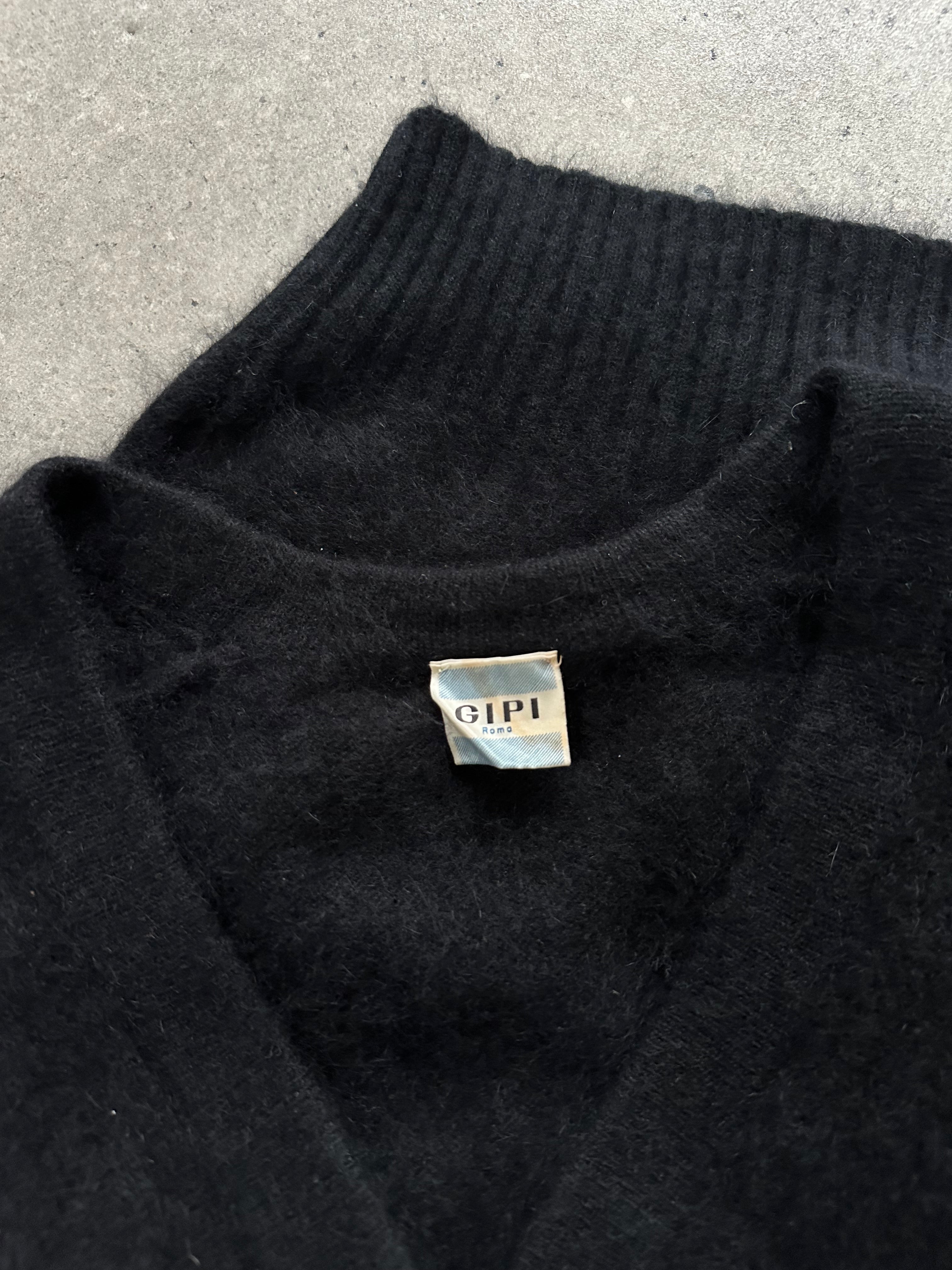 Vintage 1990s Italian angora fuzzy cardigan in soft beige with a cozy, textured knit, featuring a button-up front and ribbed cuffs.