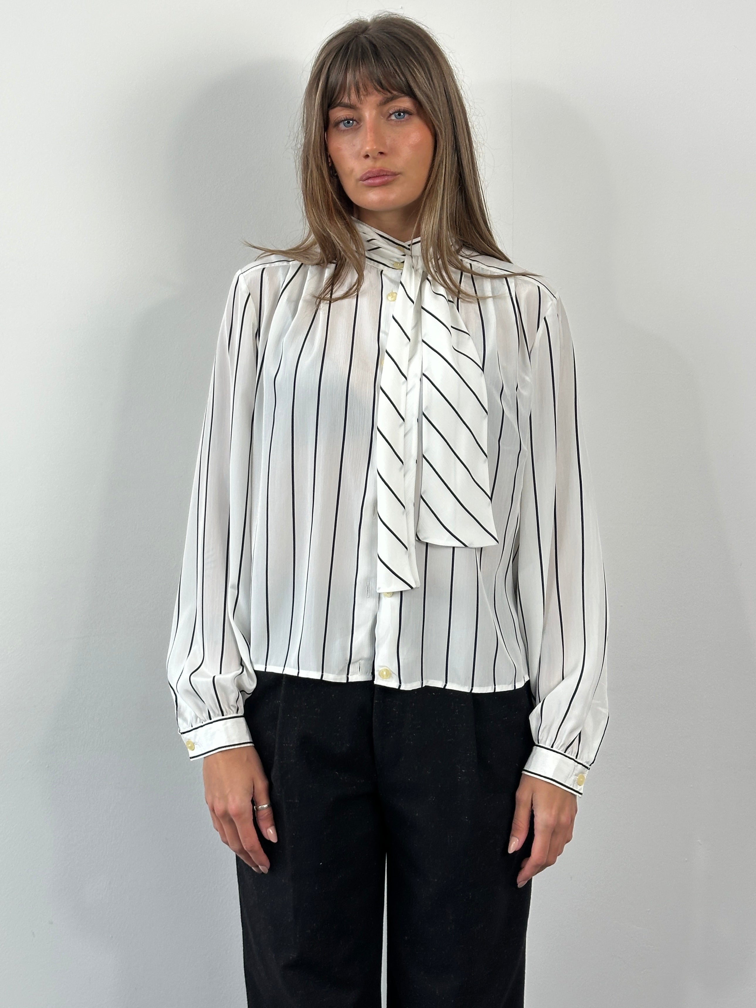 Vintage 1980s sheer stripe tie-neck shirt in size M, featuring lightweight fabric and classic retro design.