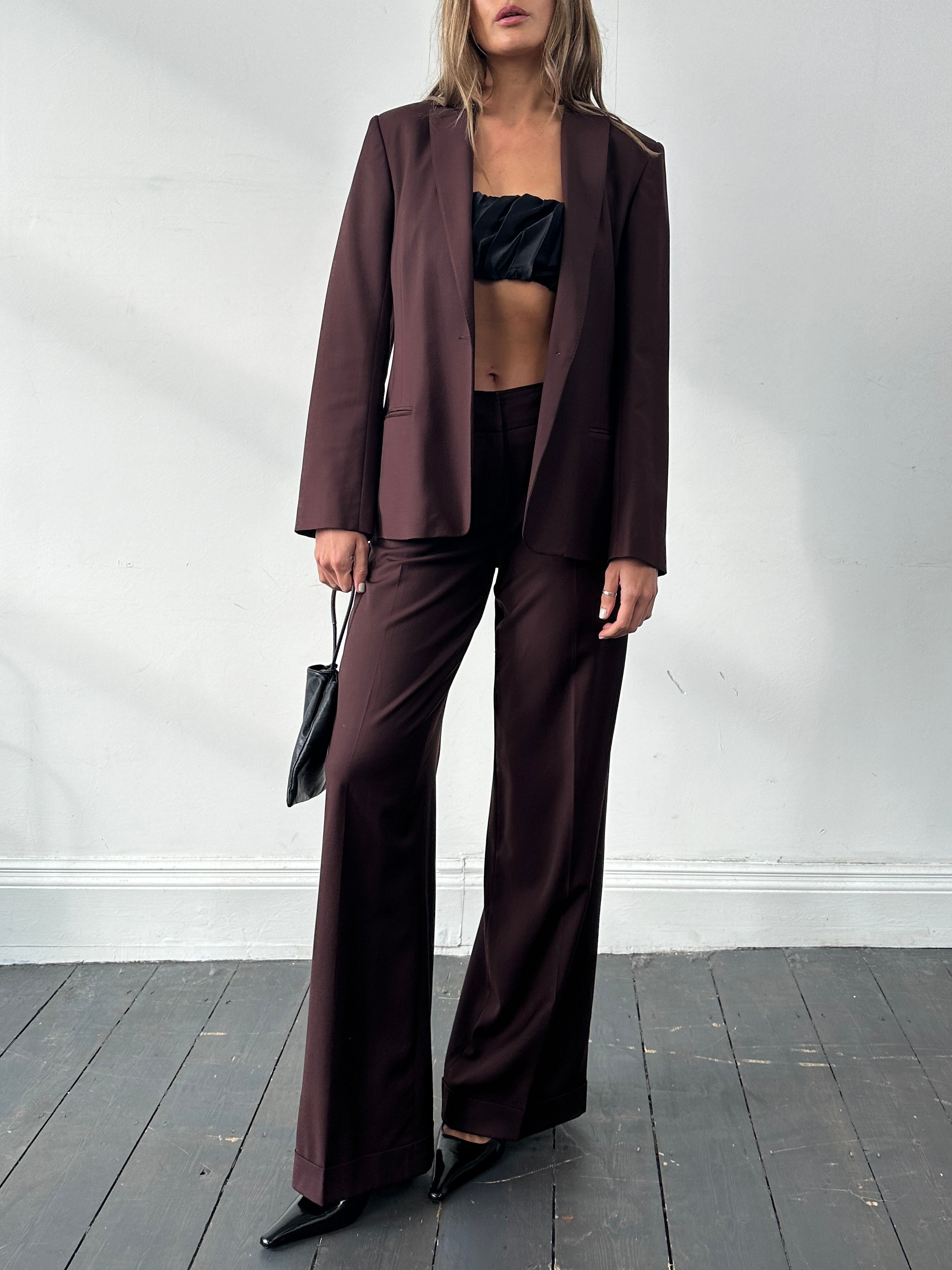 Max Studio wool jumpsuit with wide leg, single-breasted design in size M, featuring a tailored fit and classic style.
