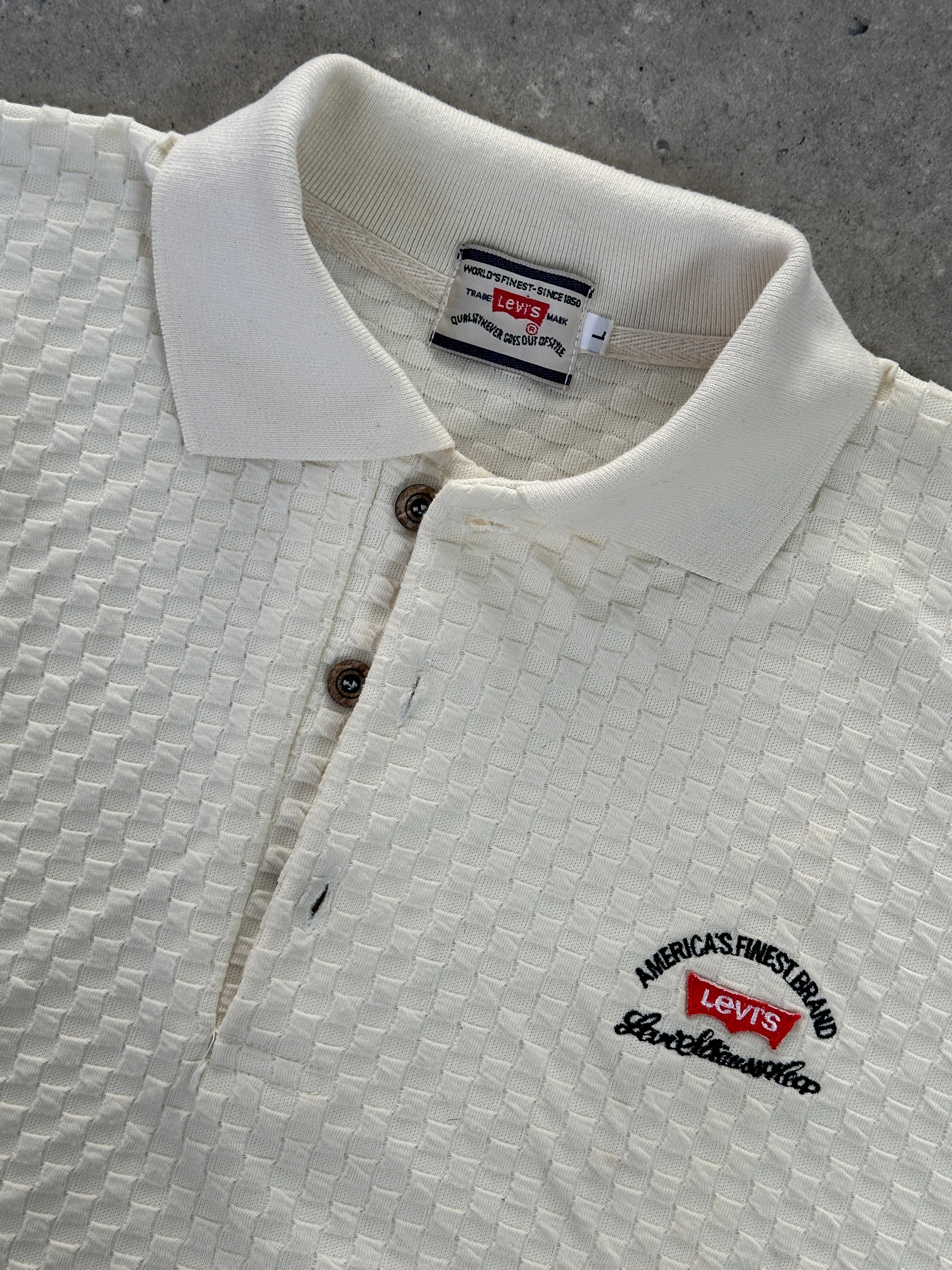 Levi’s pure cotton logo embroidery polo jumper in size L, featuring a classic fit with a embroidered Levi’s logo on the chest.