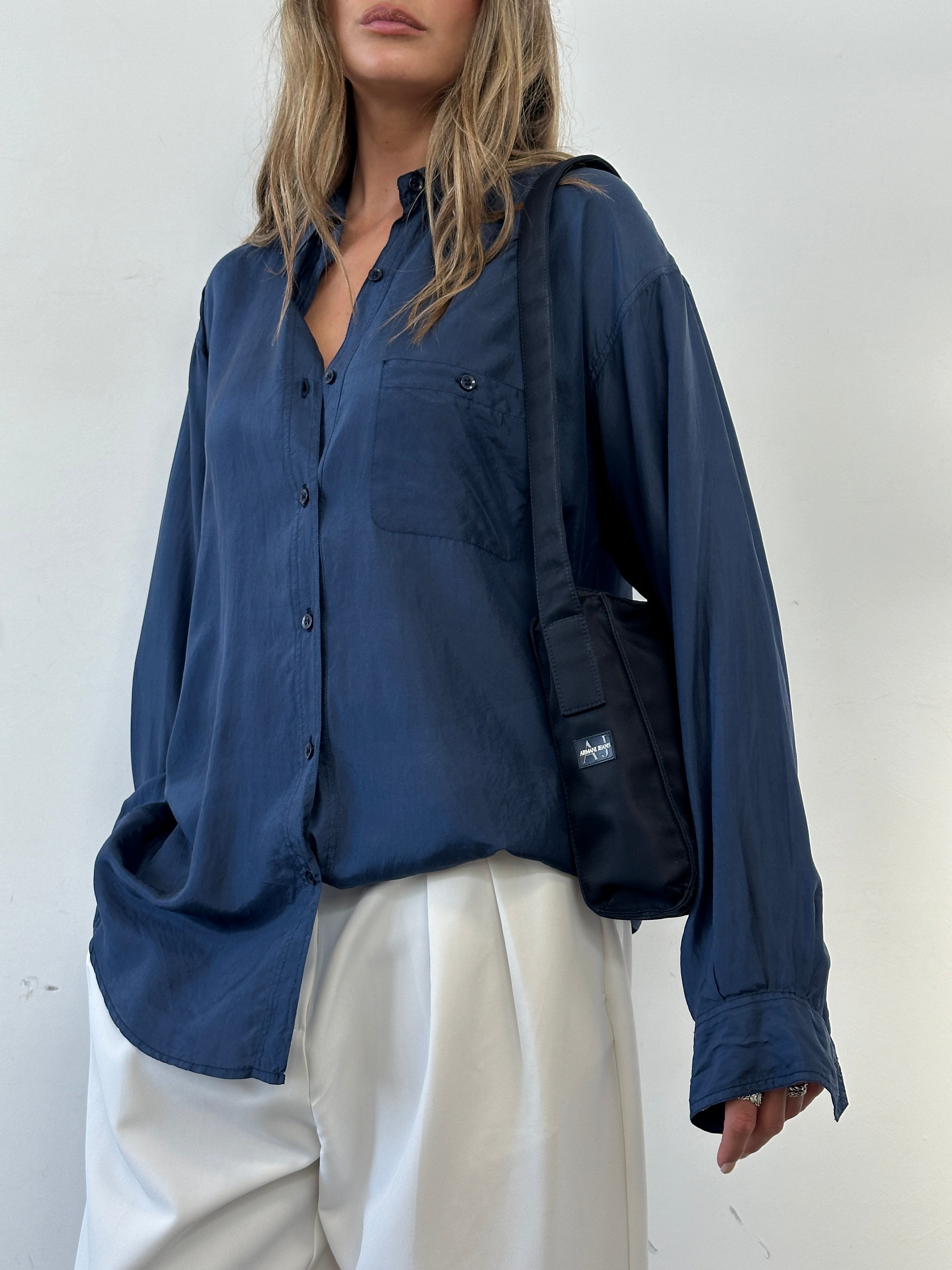 Vintage relaxed pure silk shirt in XL size, featuring a smooth silky fabric and classic design, perfect for elegant casual wear.