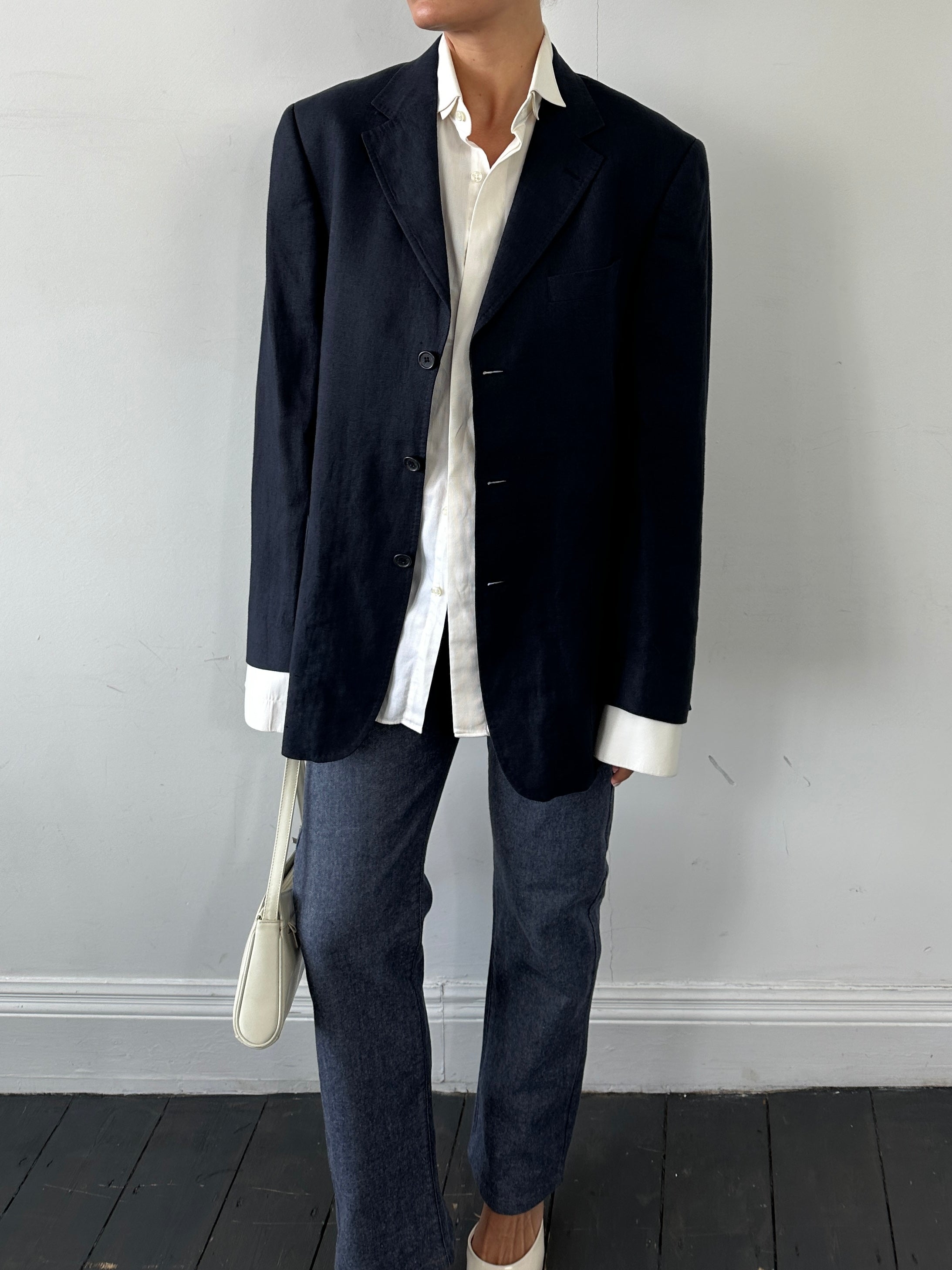 Vintage pure linen single-breasted blazer in size L, shown on a hanger with front view and classic lapel details.