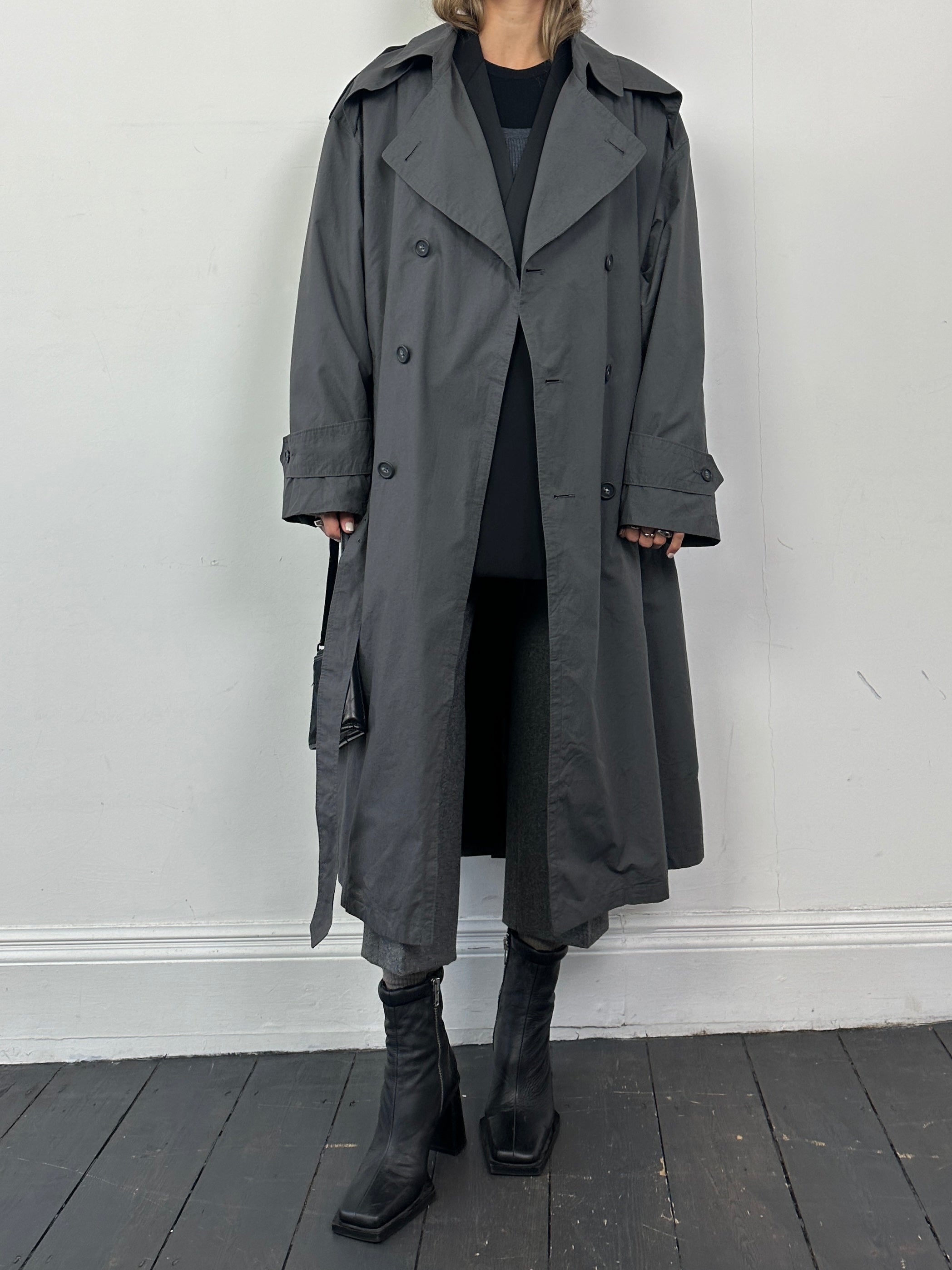 Christian Dior Monsieur cotton double-breasted belted trench coat in XL, shown on a model with classic beige design.