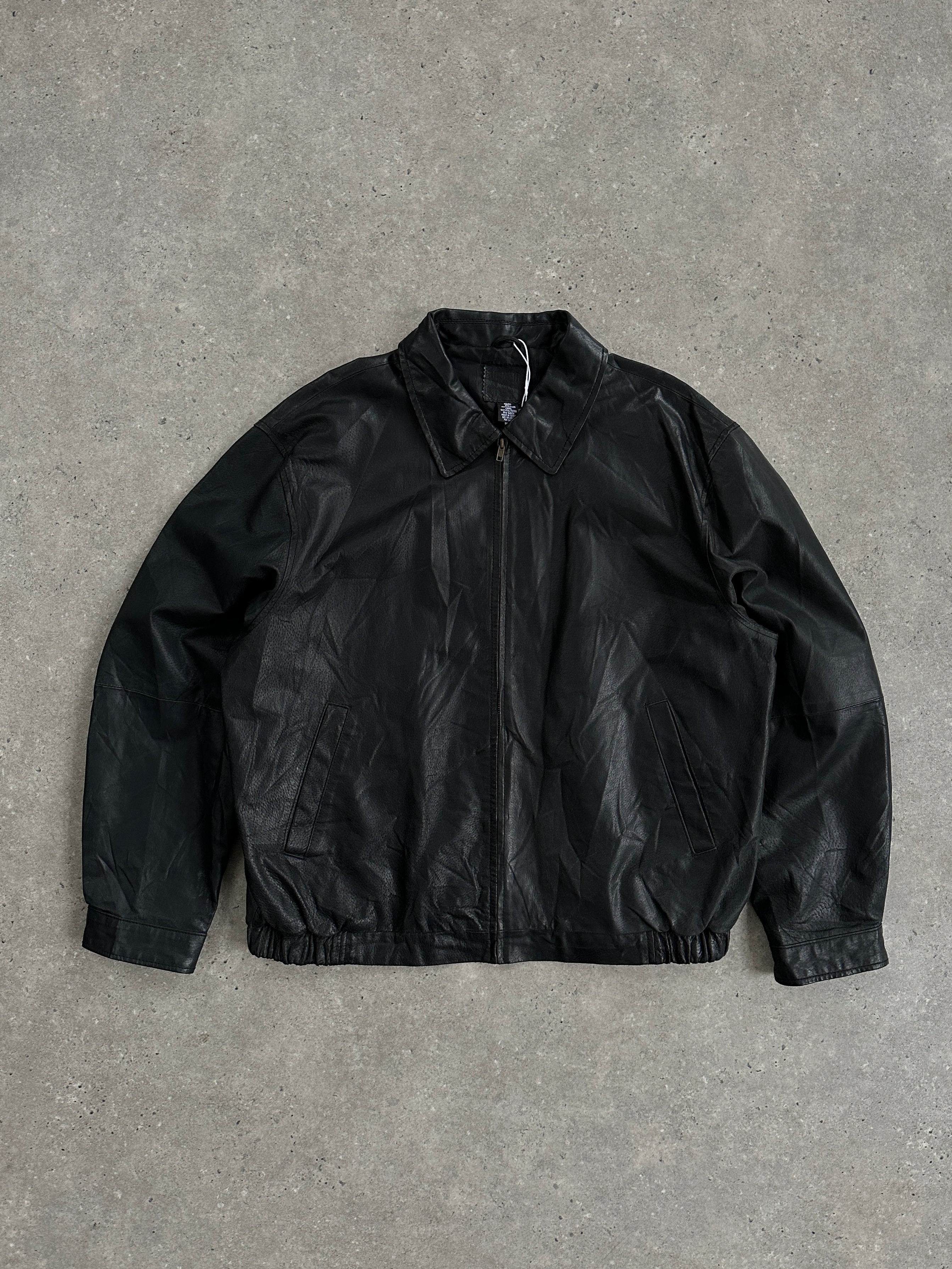 Vintage leather minimal bomber jacket in XL, featuring classic design, smooth texture, and tailored fit.